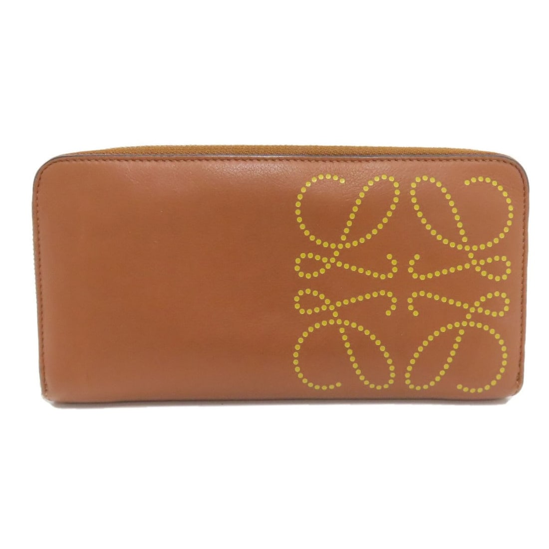 Loewe Anagram Leather Long Wallet for Women: --- Catalog ---Category: SizeSize (HxWxD): 10cm x 20cm x 2cm / 3.93'' x 7.87'' x 0.78''Category: DesignType: Long wallet (bi-fold)Color: BrownGender: WomenClosure: ZipperMaterial: Leather Inner Pocket
