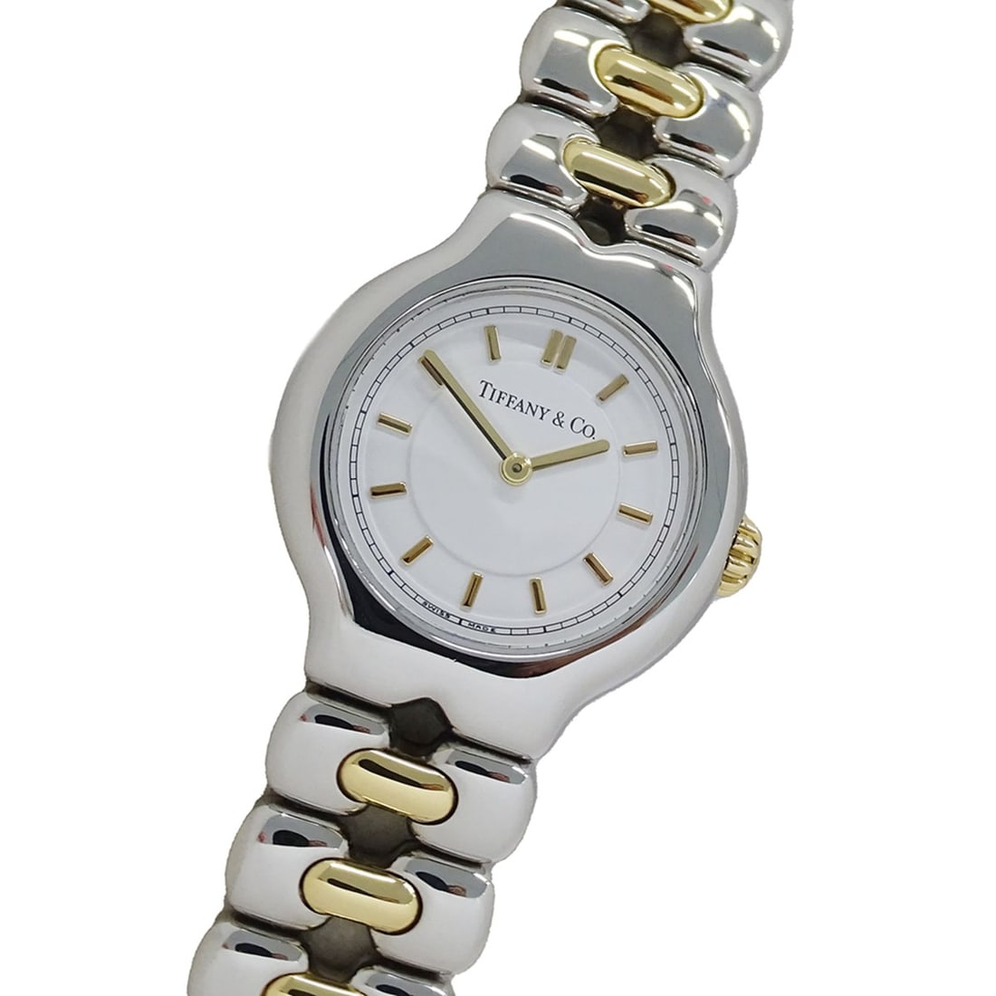 Tiffany & Co. Women's Watch, Tesolo Quartz (QZ), Stainless Steel (SS) Gold Plated (GP) L0112: --- Catalog ---Category: SizeWrist Size: 16cm / 6.29''Case Diameter: 24mm / 0.94''Category: DesignType: WristwatchGender: WomenColor (Dial): WhiteMaterial (Band): Gold plated, Stainless steelMaterial 