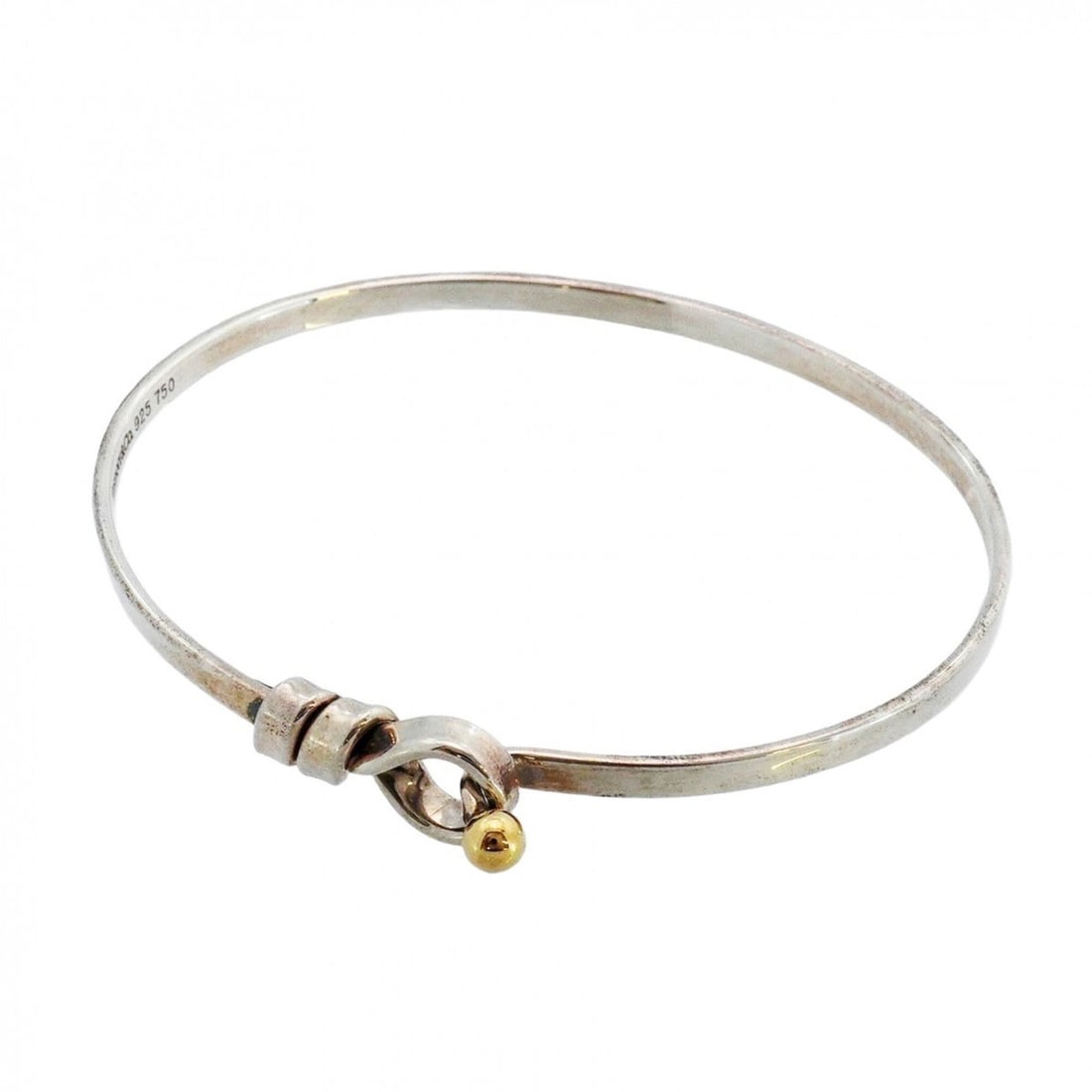 Tiffany & Co. Hook Eye Bangle, 18K Yellow Gold (KYG), Sterling Silver 925, for Men and Women: --- Catalog ---Category: SizeLength: 17cm / 6.69''Category: DesignType: BangleGender: Men,WomenMaterial: Silver 925, Yellow gold (18K)Category: GeneralBrand: Tiffany--- Item List ---Section: Condition