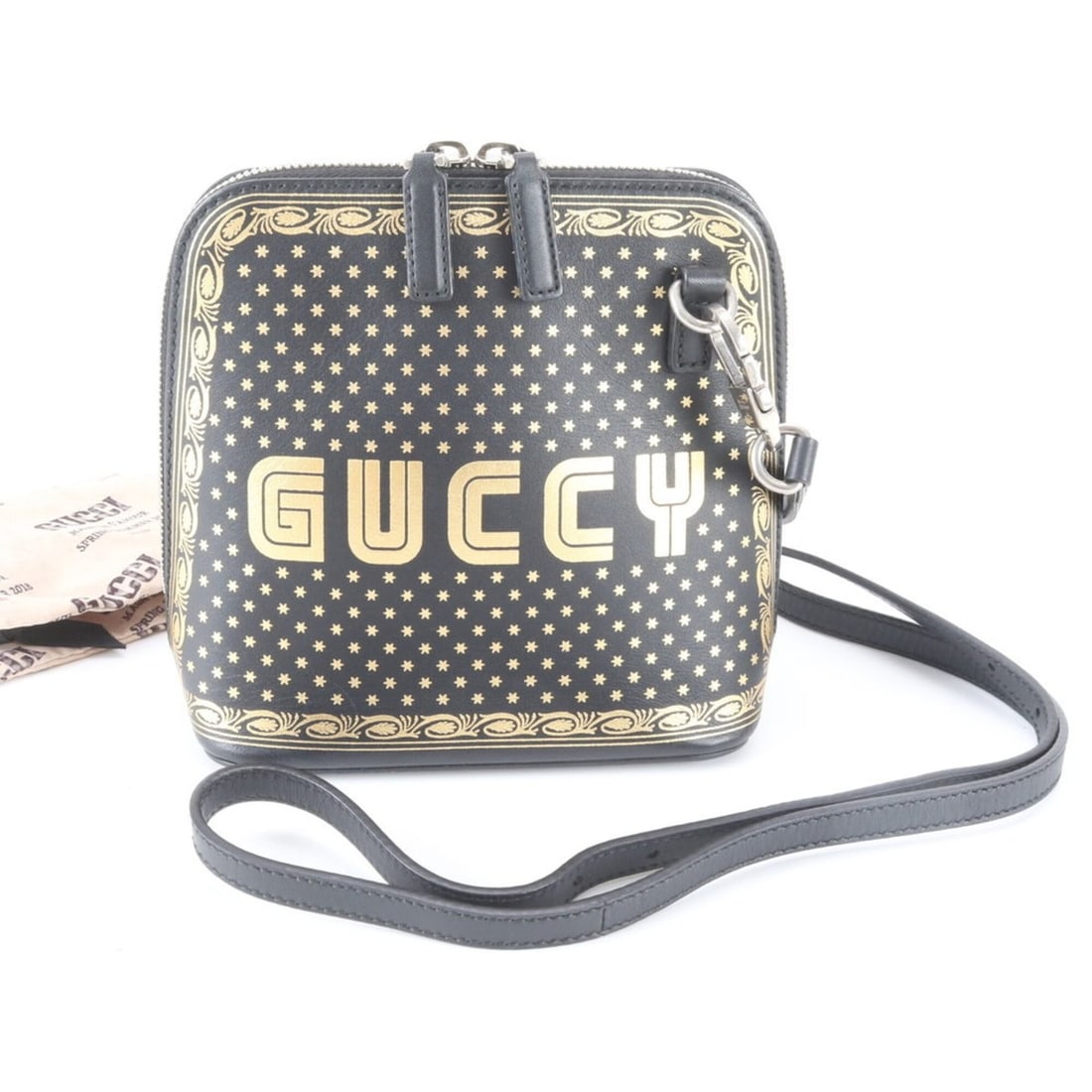 Gucci x SEGA Collaboration GUCCY Logo 511189 Leather Shoulder Bag Black Gold Women's: --- Catalog ---Category: SizeSize (HxWxD): 18cm x 16cm x 8cm / 7.08'' x 6.29'' x 3.14''Category: DesignType: Shoulder bagColor: Black, GoldGender: WomenMaterial: Leather Category: GeneralBrand: GucciC