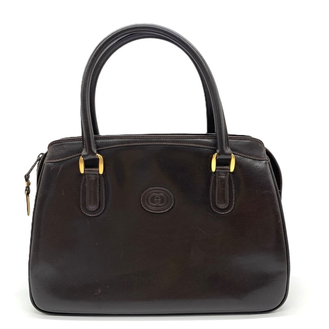 Gucci Old Leather Handbag Interlocking G Dark Brown GUCCI: --- Catalog ---Category: SizeWeight: 642g / 1.41lb.Size (HxWxD): 22.5cm x 32cm x 9cm / 8.85'' x 12.59'' x 3.54''Handle Length: 13cm / 5.11''Category: DesignType: HandbagColor: Dark brownStyle: Classic