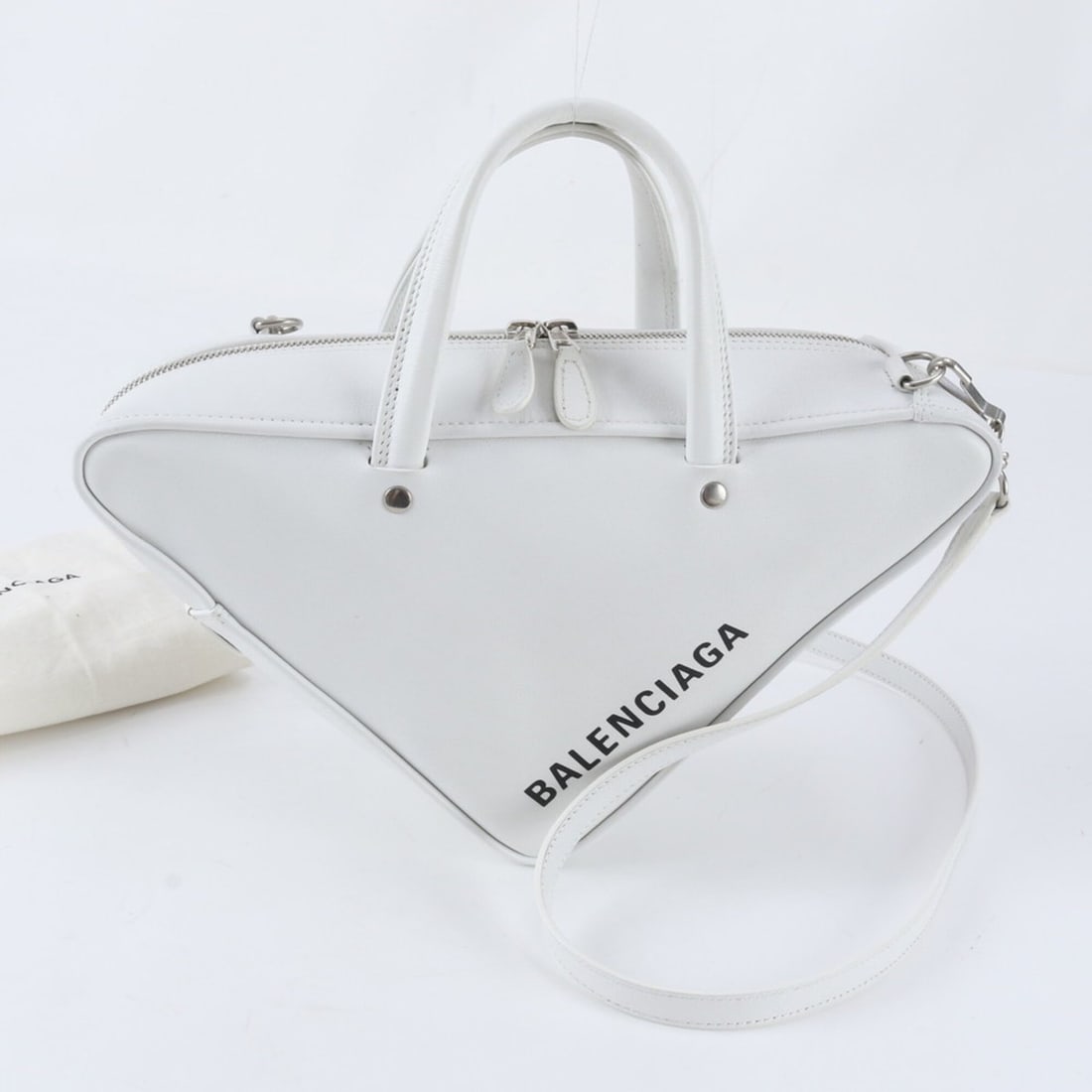 Excellent condition Balenciaga Triangle Duffle Leather 2-Way Shoulder Bag/Crossbody Handbag for: --- Catalog ---Category: SizeSize (HxWxD): 20cm x 24cm x 9cm / 7.87'' x 9.44'' x 3.54''Category: DesignType: Handbag, Shoulder bagColor: WhiteGender: WomenMaterial: Leather Category: GeneralBrand: Bal
