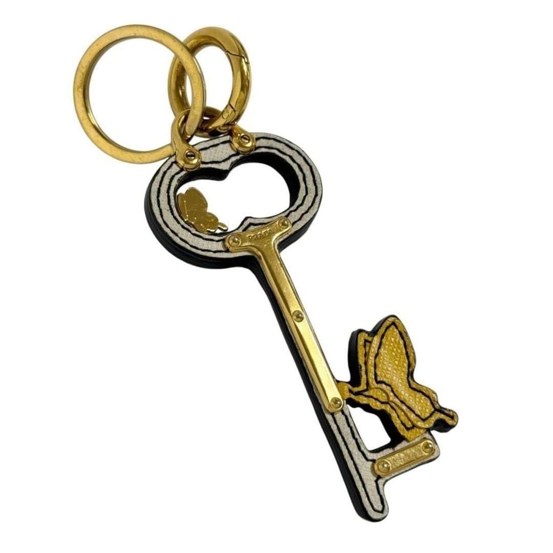 Prada Women's Keyring Keychain Bag Charm Butterfly Leather: --- Catalog ---Category: DesignType: KeyringGender: WomenMaterial: Leather, MetalCategory: GeneralBrand: Prada--- Item List ---Section: ConditionRanking: Rank A Used - A few traces of usage, some scra