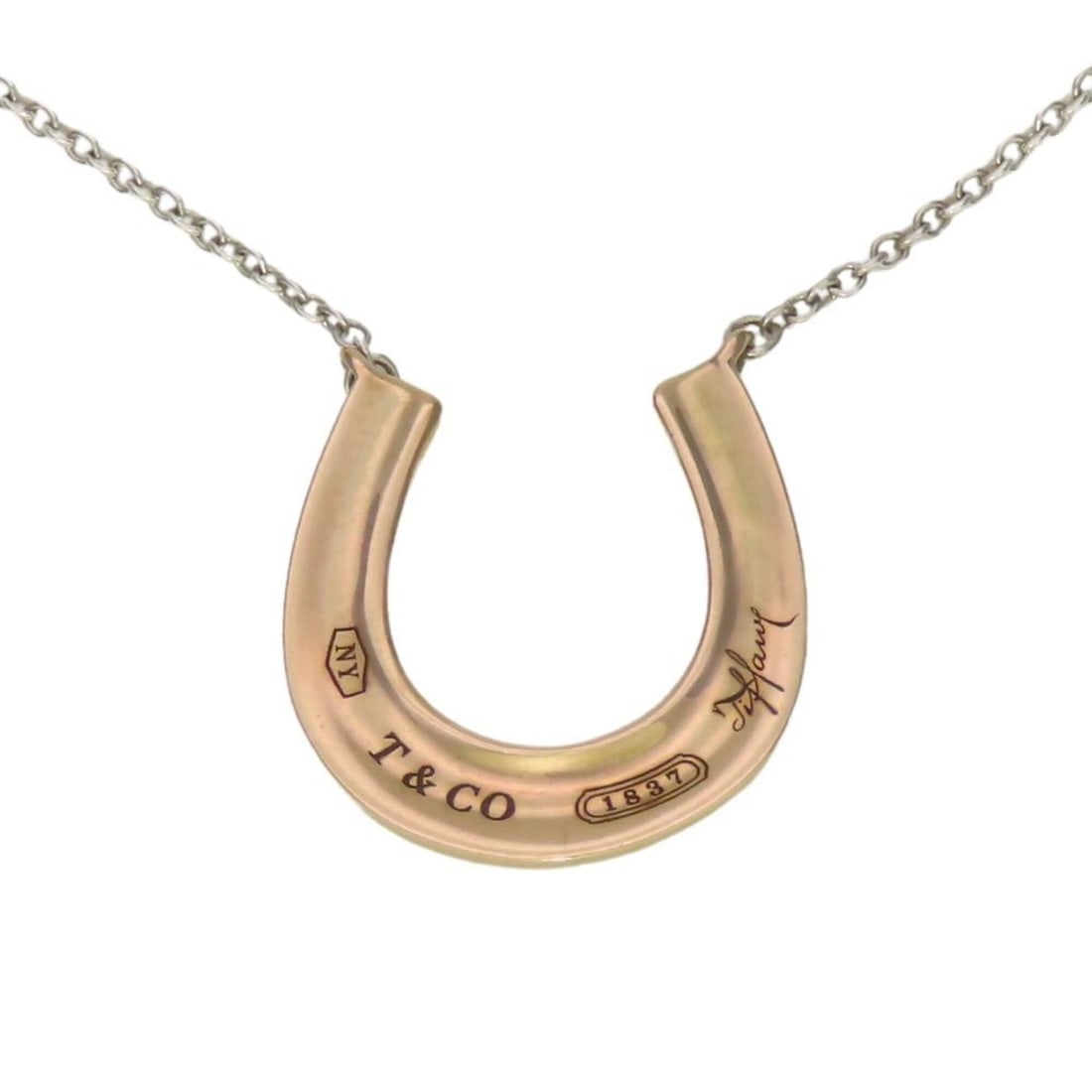 Tiffany & Co. Horseshoe Necklace 1837 Rubedo Metal SV925 Pink Gold Women's: --- Catalog ---Category: SizePendant Size: 17mm x 16.1mm / 0.66'' x 0.63''Neck Circumference: 47.5 cm / 18.7''Category: DesignColor: Pink gold, SilverGender: WomenMaterial: Metal, Silver 925Necklace T