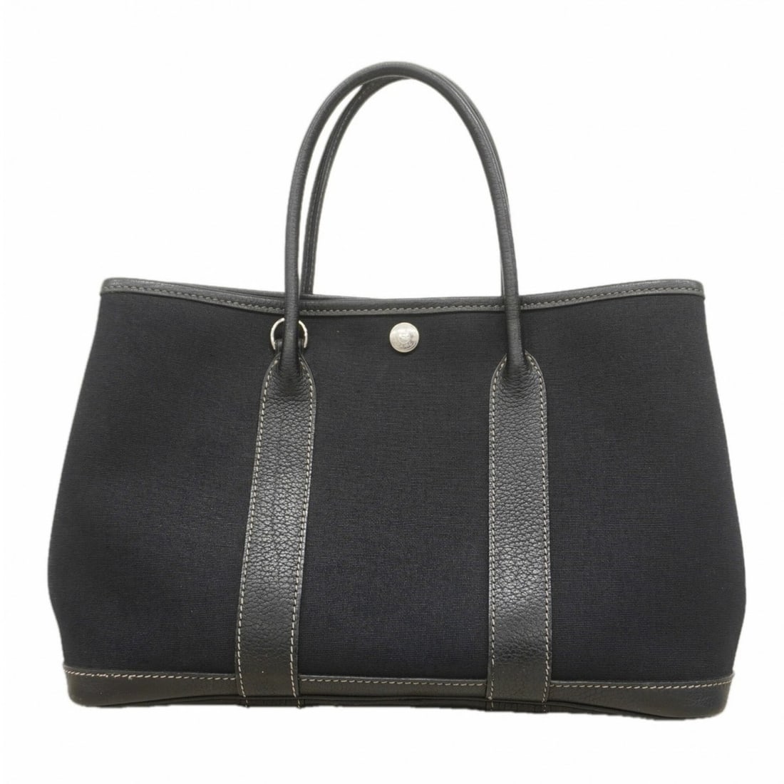 Hermes Garden TPM Toile Officier Black Tote Bag (?H stamp) - Ladies: --- Catalog ---Category: SizeSize (HxWxD): 20.5cm x 30.5cm x 13cm / 8.07'' x 12'' x 5.11''Category: DesignType: Tote bagColor: BlackGender: WomenMaterial: Toile officier Hardware Color: SilverCategory