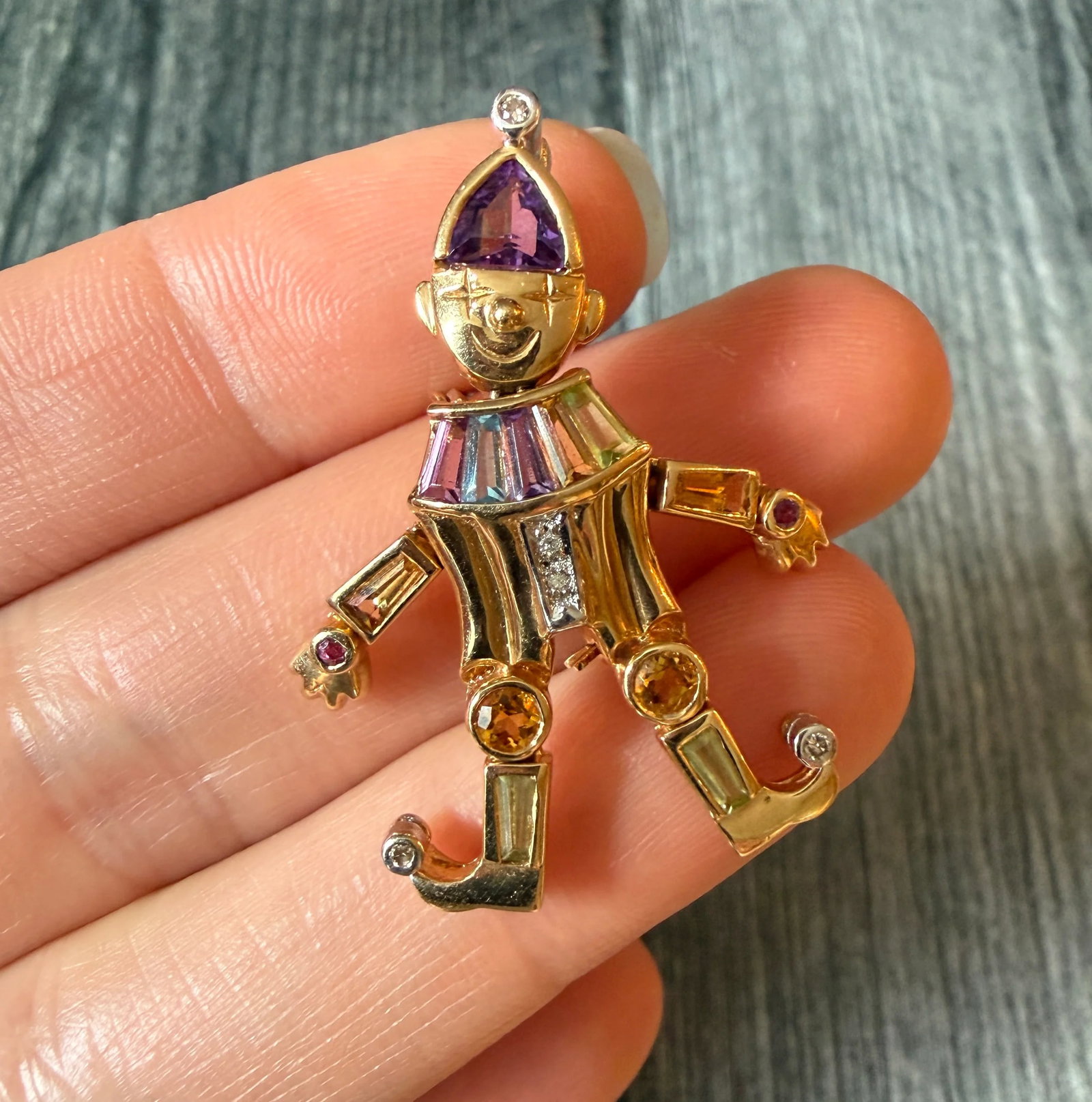 Articulated Gem-Set Clown Pin and Pendant in 14K Gold (A): Metal: 14K Yellow Gold Weight: 7.7 gramsMeasurement: 1.5 inches long by 1.25 inches wideMarkings: "14K 585"Condition: In good vintage condition with some minor surface wear consistent with ageFollow