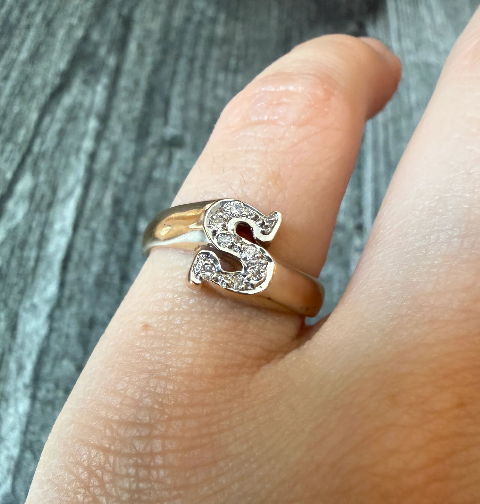 Diamond and 14K Gold Initial S Bypass Ring: Metal: 14K Yellow GoldWeight: 4.1 gramsDiamonds: Approximately 0.03 caratsRing Size: 6.5 (resizable)Condition: In good condition with some minor surface wearFollow us on Instagram @alphaomegajewelry f