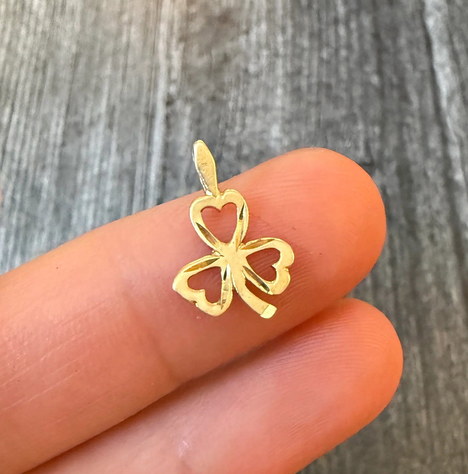 Small 14K Gold Clover Shamrock Charm: Metal: 14K Yellow Gold Weight: 0.4 gramsMeasurements: 0.5 inches long by 0.45 inches wideMarkings: "14K"Condition: In very good condition with some minor surface wear Follow us on Instagram