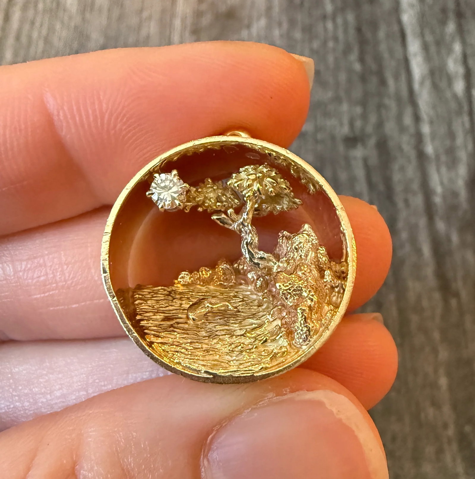 Bryson Designs 3D Scenes Whale Tail and Cliffside Pendant (S): Metal: 14K Rose, Green, and Yellow Gold Weight: 12.3 gramsMeasurements: 0.8 inch wideMarkings: "1990 Bryson .583"Condition: In very good condition with some minor surface wear Follow us on Instagram