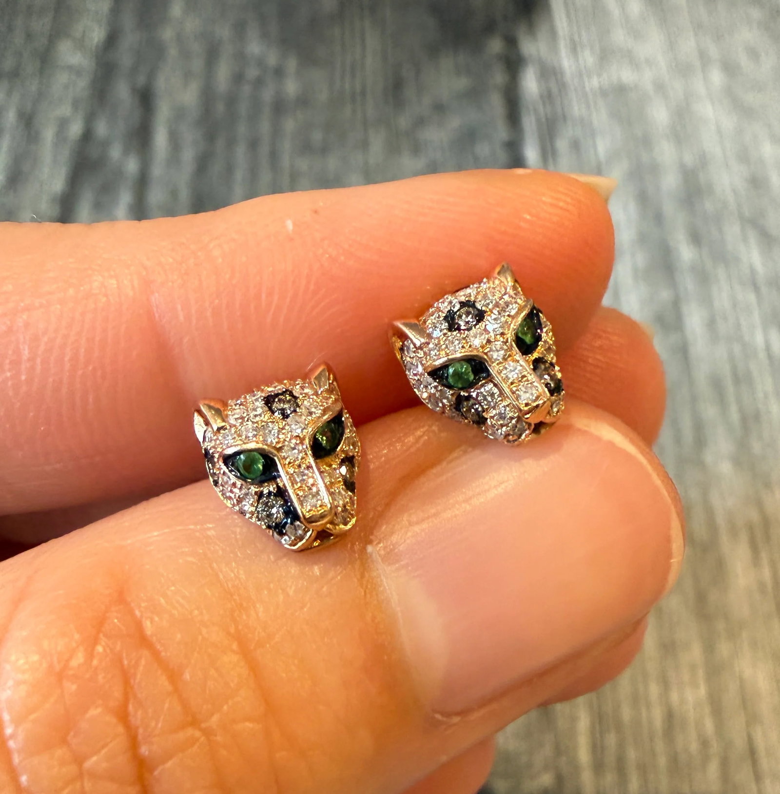 Panther Stud Earrings with Diamond and Emerald in 14K Gold: Metal: 14K Rose Gold Weight: 2.6 gramsDiamonds: Approximately 0.90 caratsMeasurements: 0.4 inches long by 0.3 inches wideMarkings: "14K EFFY"Condition: In good condition with some minor surface wear. 