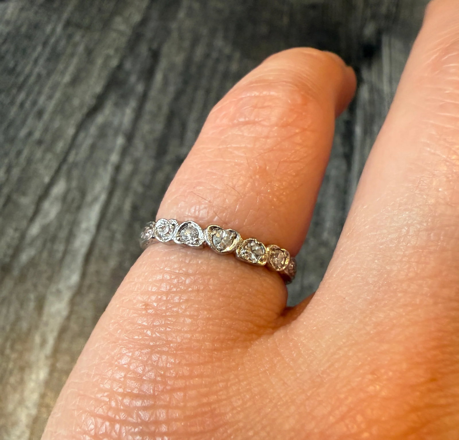 Vintage Heart Set Diamond Engraved Platinum Band, Size 4.75: Metal: PlatinumWeight: 2.6 gramsRing Size: 4.75 (not sizable)Width: 2.7 mm widthMarkings: "Platinum" (slightly faded)Condition: In good vintage condition with some minor surface wear consistent with a