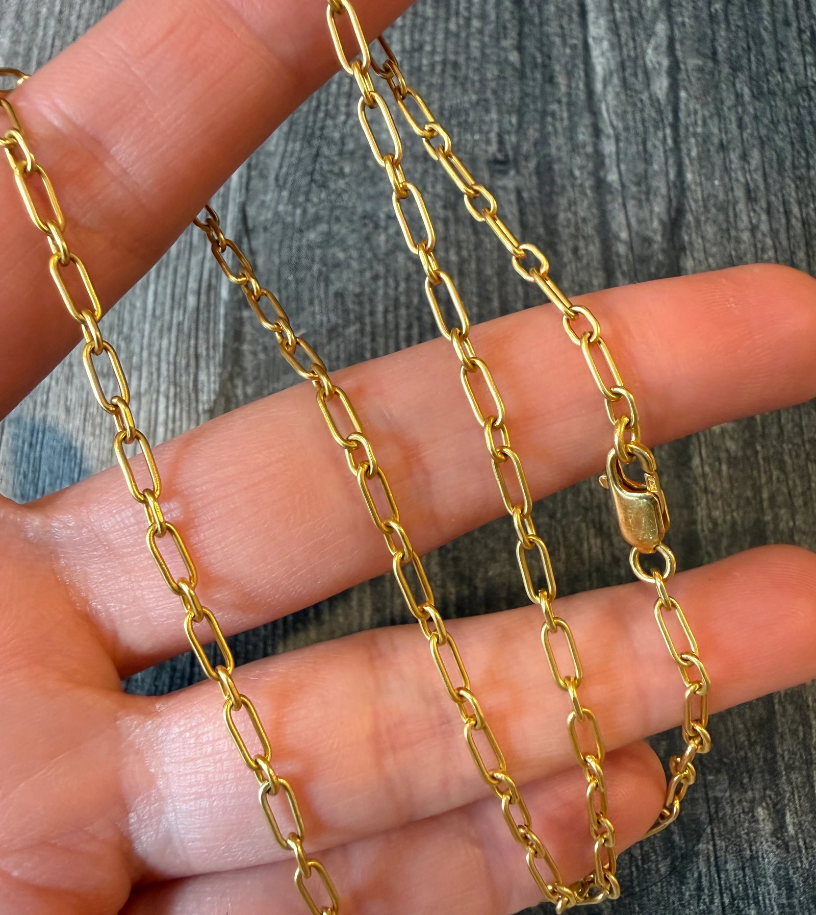 Solid Matte Paperclip 18K Gold Chain, 19.75?? Long: Metal: 18K Yellow Gold Weight: 10 gramsMeasurements: 19.75 inches long by 1.7 mm wide Markings: "750"Condition: In very good condition with some minor surface wear Follow us on Instagram @alphaomegaje