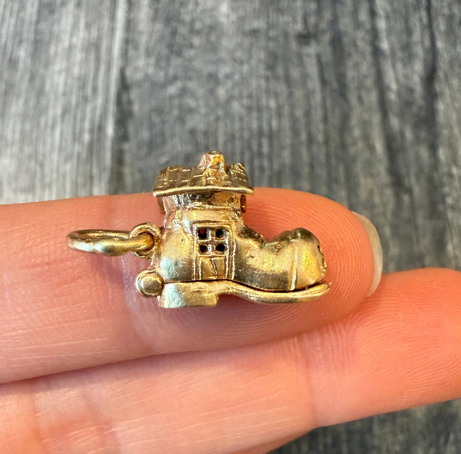 Vintage Old Woman Who Lived In Shoe Charm in 14K Gold: Metal: 14K Yellow Gold Weight: 5.1 gramsMeasurements: 0.6 inches long by 0.5 inches wideMarkings: "14K"Condition: In very good condition with some minor enamel loss and some surface wear Follow us on 
