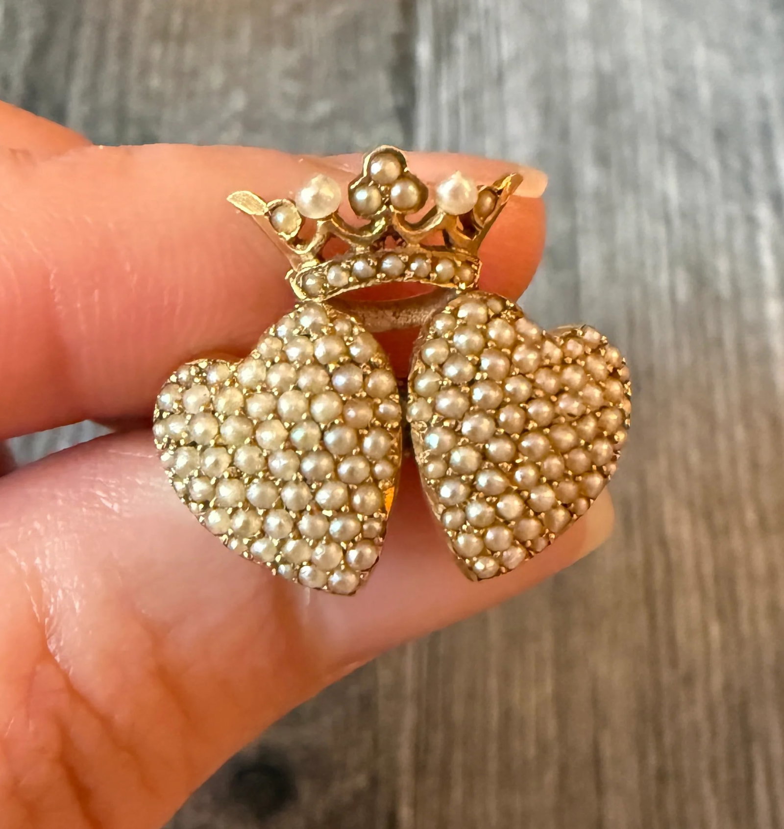 Victorian Pearl and 14K Gold Crowned Hearts Pin: Metal: 14K Yellow Gold Weight: 3.3 gramsMeasurement: 0.8 inches long by 0.85 inches wide Condition: In very good antique condition with some minor surface wear consistent with age.Follow us on Instagr