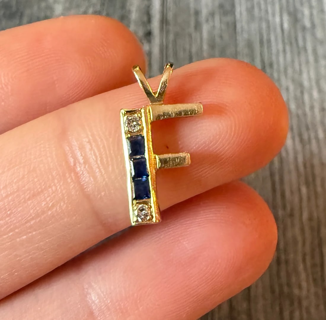 Sapphire and Diamond Initial F Charm: Metal: 14K Yellow Gold (acid tested)Weight: 1.1 gramsMeasurements: 0.5 inches long by 0.35 inches wideMarkings: NoneCondition: In very good condition with some minor surface wear. Follow us on Instagr