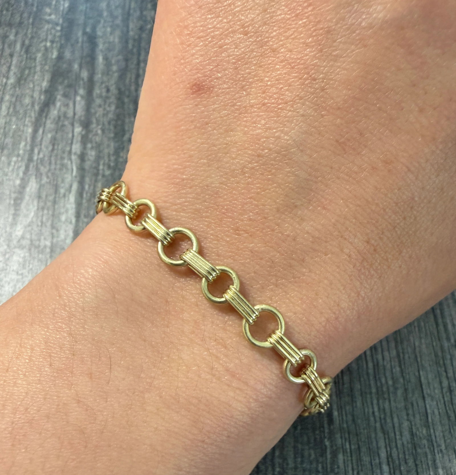Vintage Book Chain Style 14K Gold Charm Bracelet, 7?? Long: Metal: 14K Yellow Gold Weight: 11.2 gramsMeasurements: 7 inches long by 6.9 mm wideMarkings: "14K"Condition: In very good vintage condition with some minor surface wear.Follow us on Instagram @alphaom
