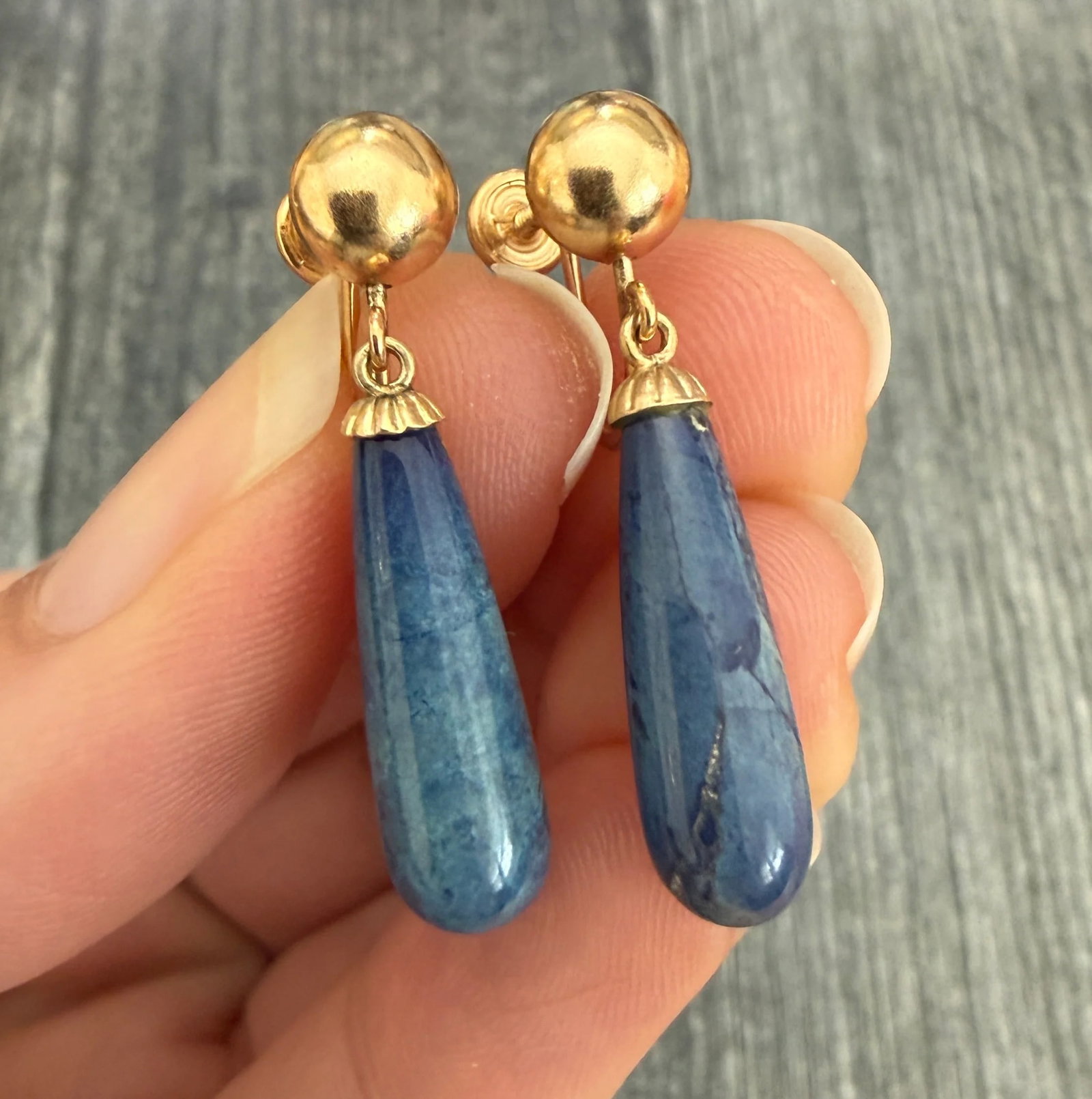 Vintage Sodalite and 14K Gold Dangle Earrings: Metal: 14K Yellow Gold Weight: 3.8 gramsMeasurements: 1.25 inches longMarkings: "14K"Condition: In good vintage condition with some minor surface wear. We can convert these for pierced ears by adding 
