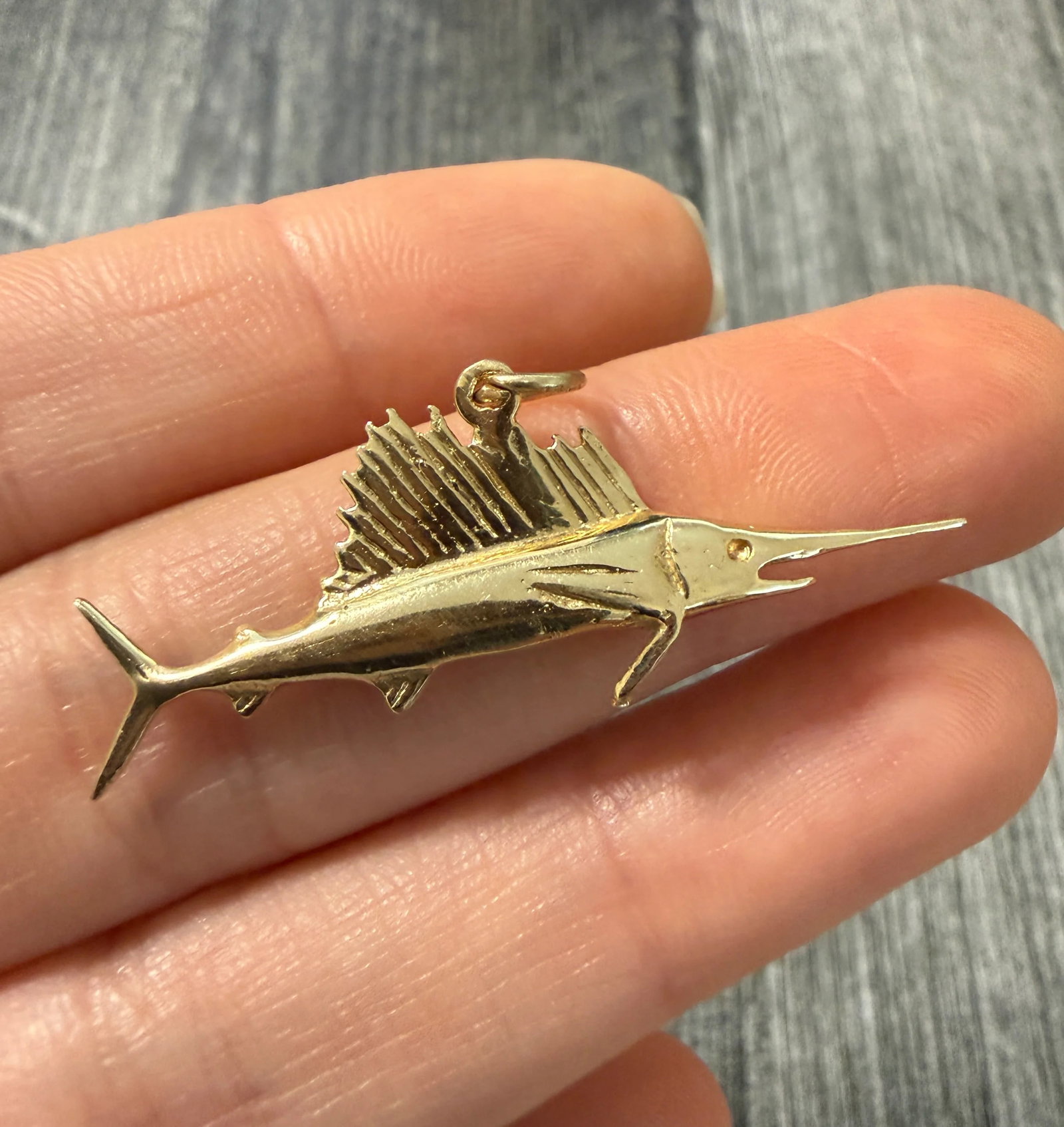 Vintage 14K Gold Marlin or Swordfish Charm: Metal: 14K Yellow Gold Weight: 3.7 gramsMeasurements: 0.65 inches long by 1.55 inches wideMarkings: "14K"Condition: In good vintage condition with some minor surface were consistent with ageFollow us