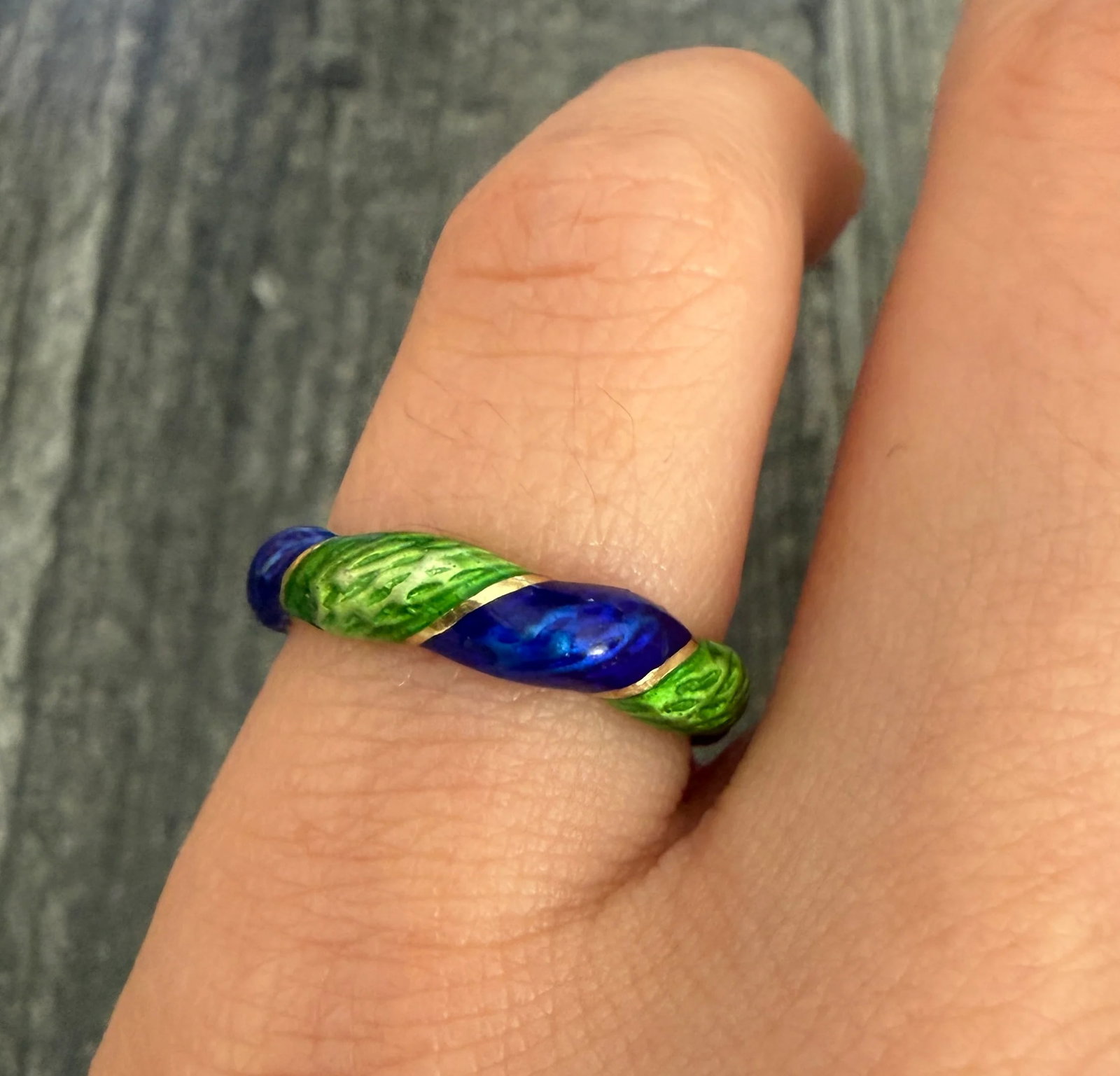 Vintage Blue and Green Enamel Twist Band in 14K Gold: Metal: 14K Yellow Gold Weight: 3.2 gramsRing Size: 5.5 (not resizable)Width 4.2 mm wideMarkings: "14K"Condition: In good vintage condition with some very minor enamel lossFollow us on Instagram