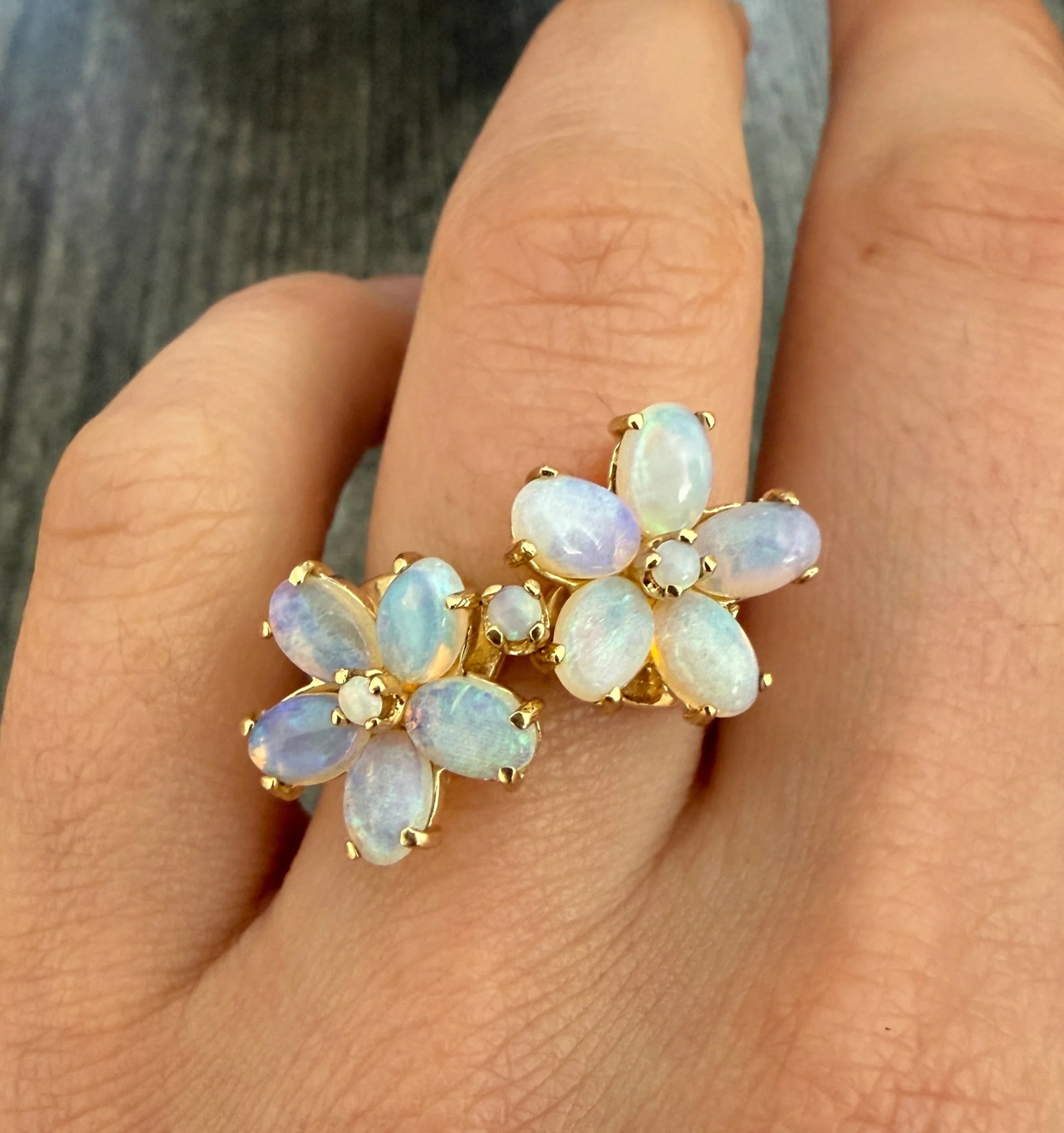 Large Opal Flower and 14K Gold Bypass Ring: Metal: 14K Yellow Gold Weight: 5.1 gramsRing Size: 6.5 (resizable)Markings: "14K"Condition: In good vintage condition with some minor surface wear consistent with ageFollow us on Instagram