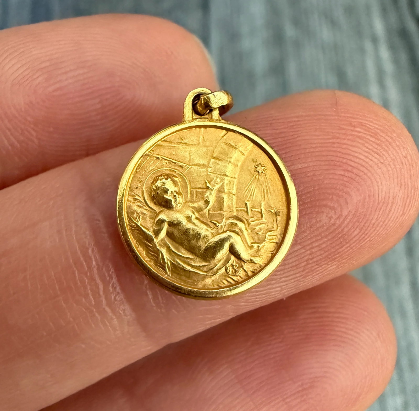 Infant Jesus Medal 14K Gold Baptism Charm: Metal: 14K Yellow Gold Weight: 0.8 gramsMeasurements: 0.5 inch diameterMarkings: "FIJ"Condition: In good vintage condition with some minor surface wear consistent with ageFollow us on Instagram