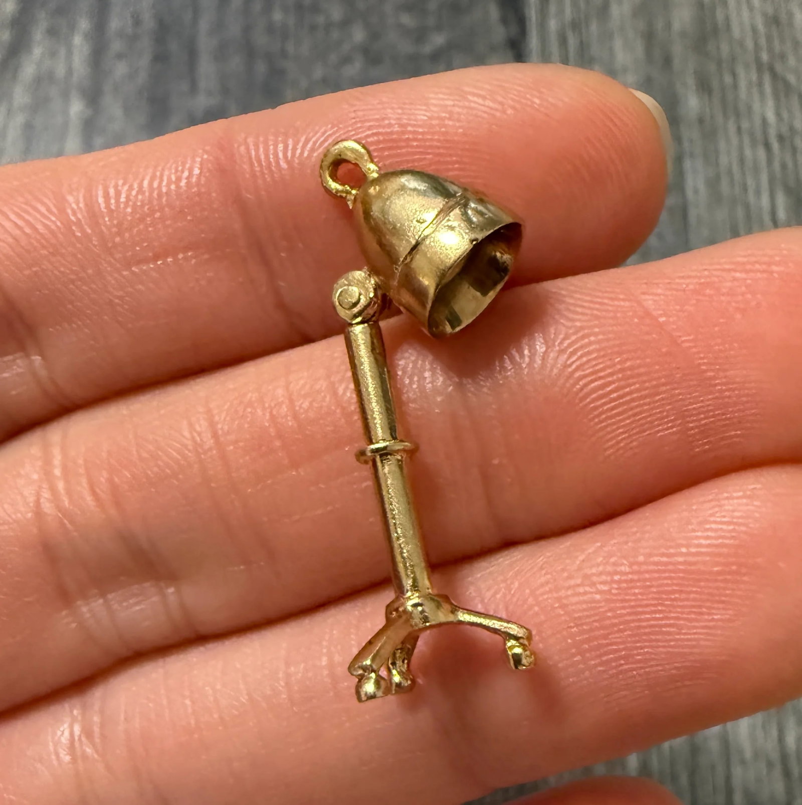 Vintage 14K Gold Articulated Hair Dryer or Floor Lamp Charm: Metal: 14K Yellow Gold Weight: 4 gramsMeasurements: 1 inch long by 0.35 inches wideMarkings: "14K"Condition: A bale can be added if requested prior to shippingFollow us on Instagram @alphaomegajewelry