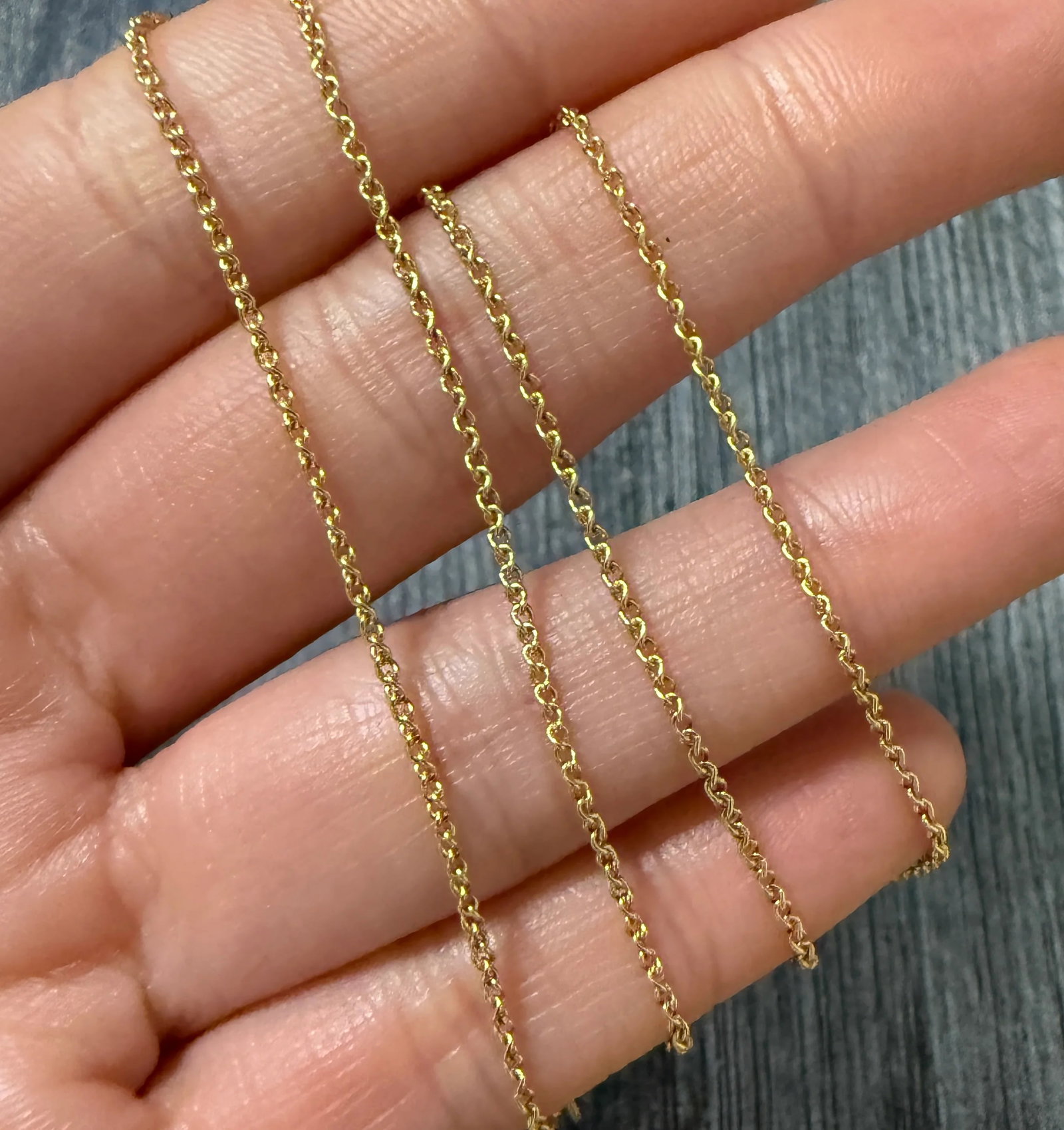 Uno a Erre Curved Cable Link 14K Gold Chain, 16" Long: Metal: 14K Yellow Gold Weight: 2.8 gramsMeasurements: 16 inches long by 1.3 mm wideMarkings: "Uno A Erre 585"Condition: In good condition with some minor surface wearNote the charm in the photos is NO