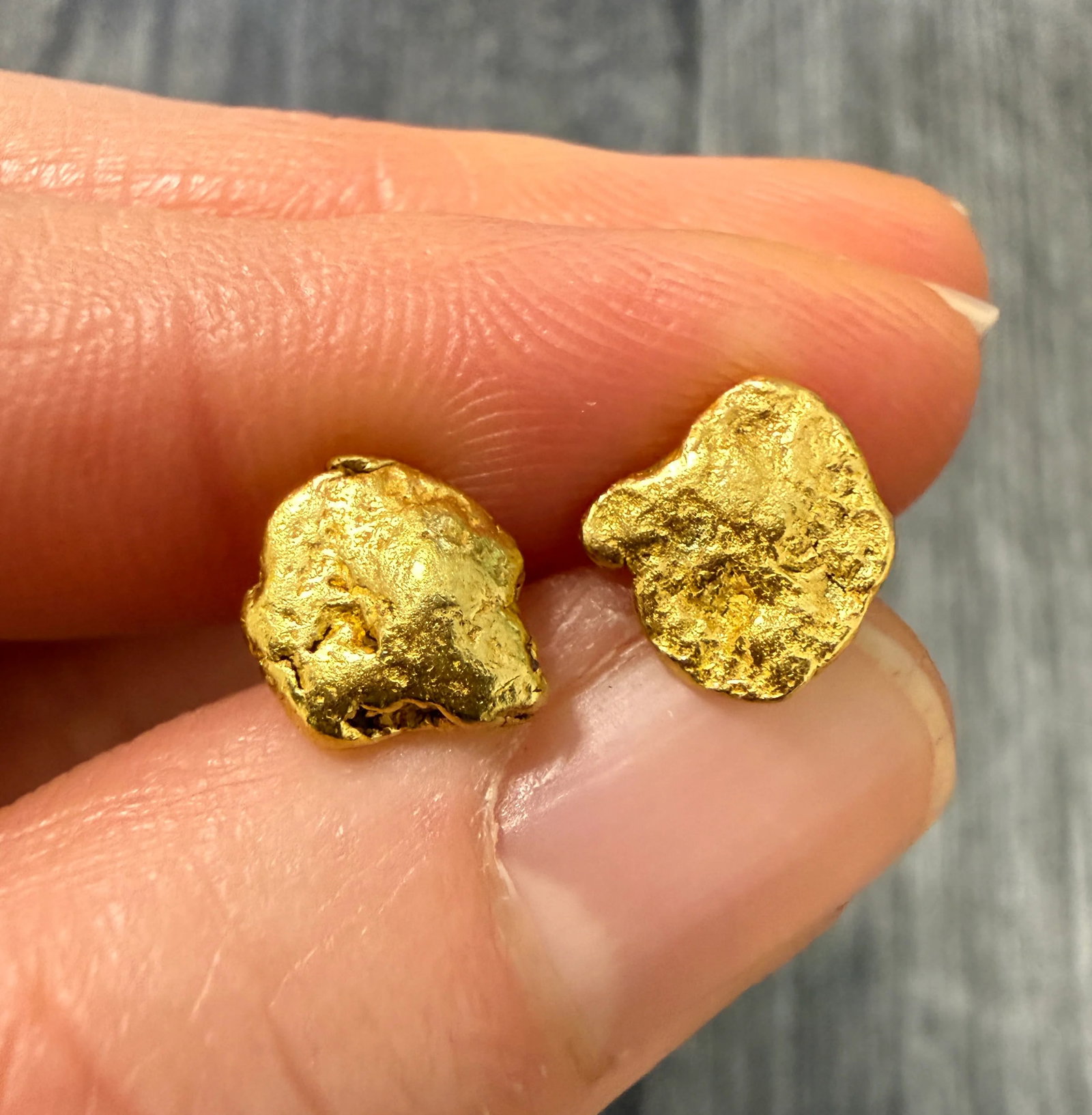 Natural 22K Gold Nugget Stud Earrings with 14K Gold Findings: Metal: 22K Yellow Gold nuggets (acid tested) and 14K Gold post and push backsWeight: 2.9 gramsMeasurements: 0.3 inches by 0.3 inches Markings: "14K" on posts and backsCondition: In good condition with