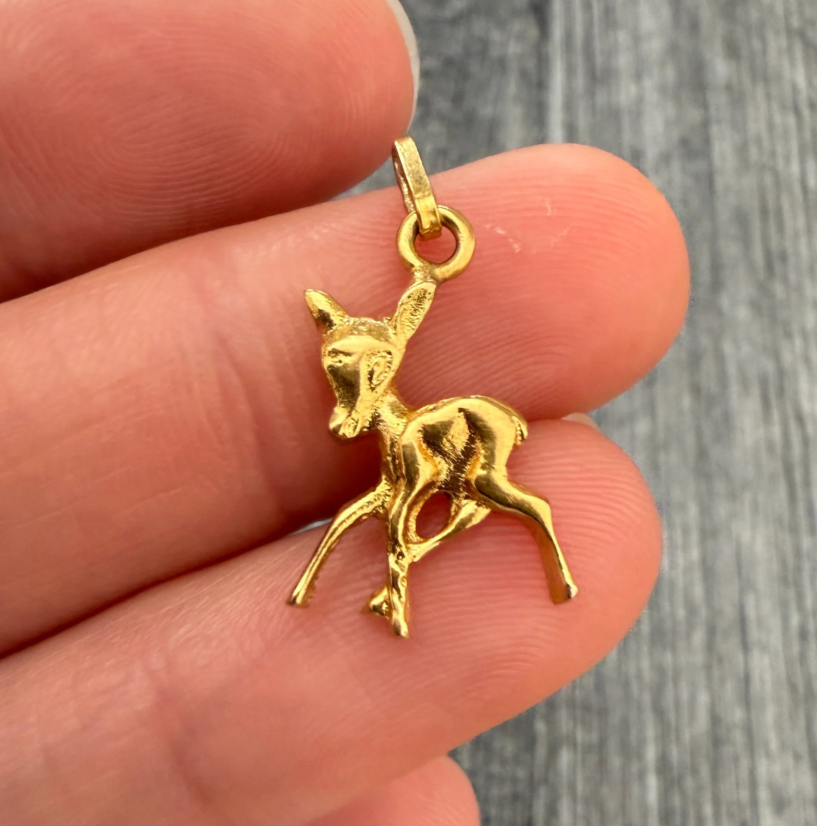 Vintage 14K Gold Bambi Deer Charm: Metal: 14K Yellow Gold Weight: 1.5 gramsMeasurements: 0.55 inches long by 0.55 inches wideMarkings: NoneCondition: In fair vintage condition with an old repair by one of the legsFollow us on Instagram