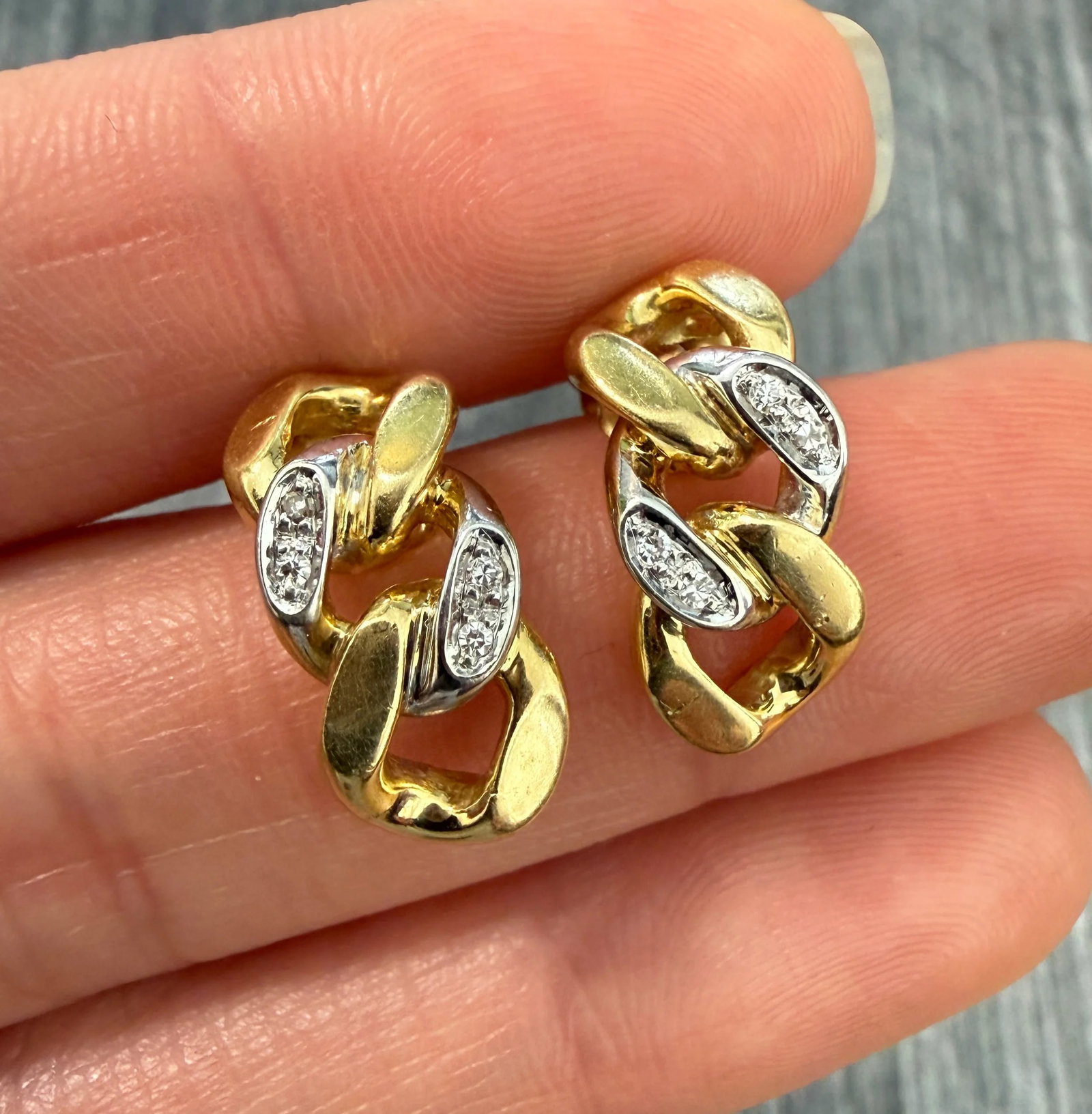Diamond and 14K Gold Curb Link Earrings: Metal: 14K Yellow GoldWeight: 7.8 gramsDiamonds: Approximately 0.04 caratsMeasurements: 0.75 inches long by 0.3 inches wideMarkings: "14K VIP"Condition: In good vintage condition with some minor surfa