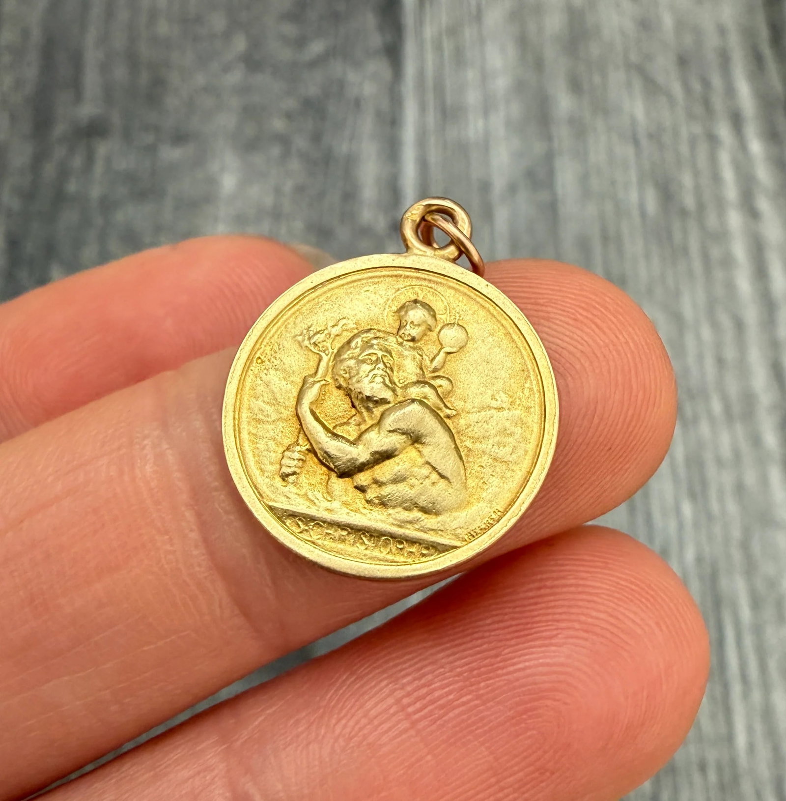 French Becker St. Christopher Medal 18K Gold Charm: Metal: 18K Yellow Gold Weight: 2.5 gramsMeasurements: 0.7 inches diameterMarkings: "S.CHRISTOPHE" "Becker" and French Eagle Condition: In very good vintage condition with some minor surface wear consi
