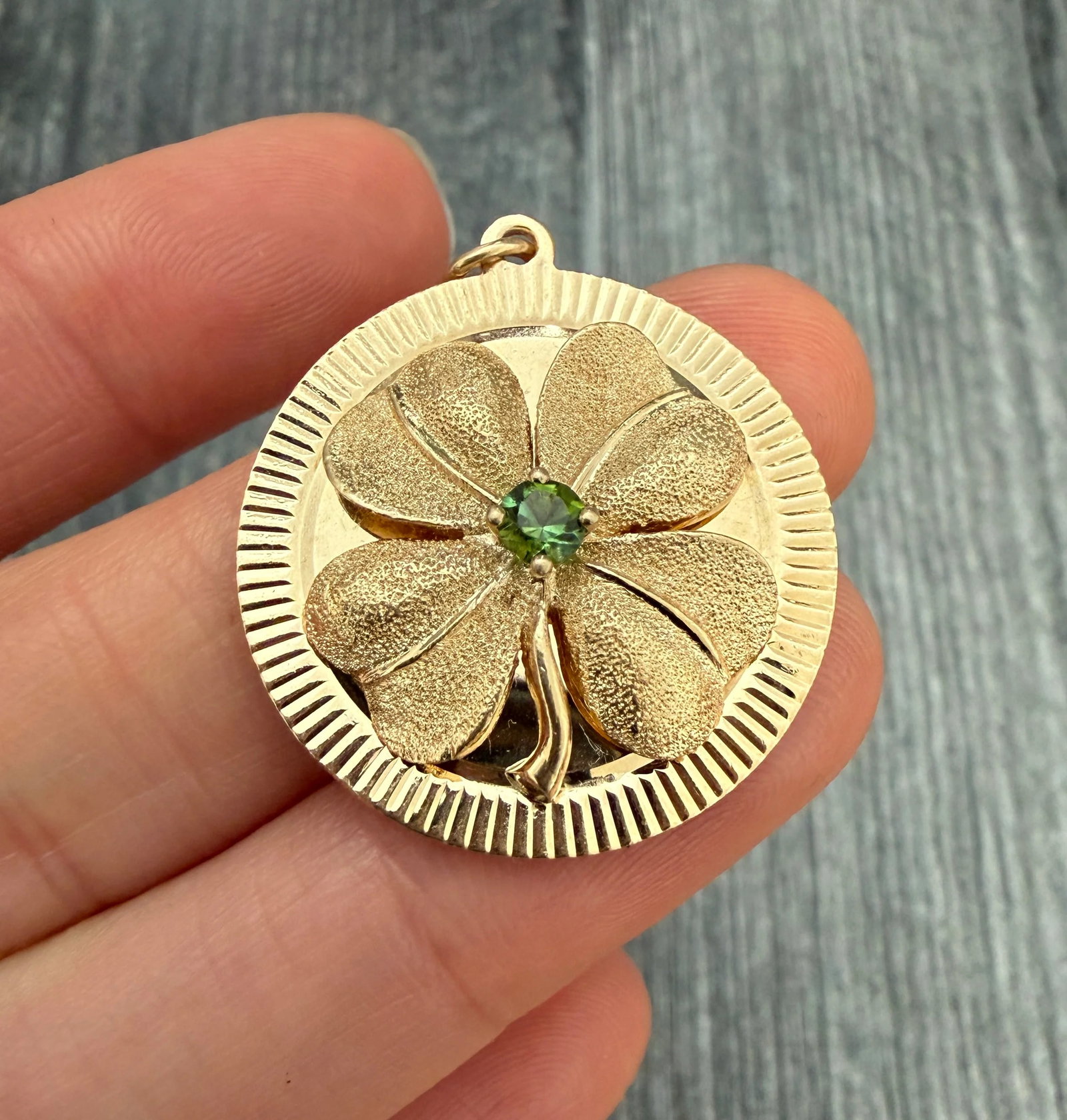 Vintage Dankner Clover Charm in 14K Gold: Metal: 14K Yellow Gold Weight: 8.3 gramsMeasurements: 1.15 inches diameterMarkings: "14K" with faded maker's markCondition: In very good vintage condition with some minor surface wear consistent with 