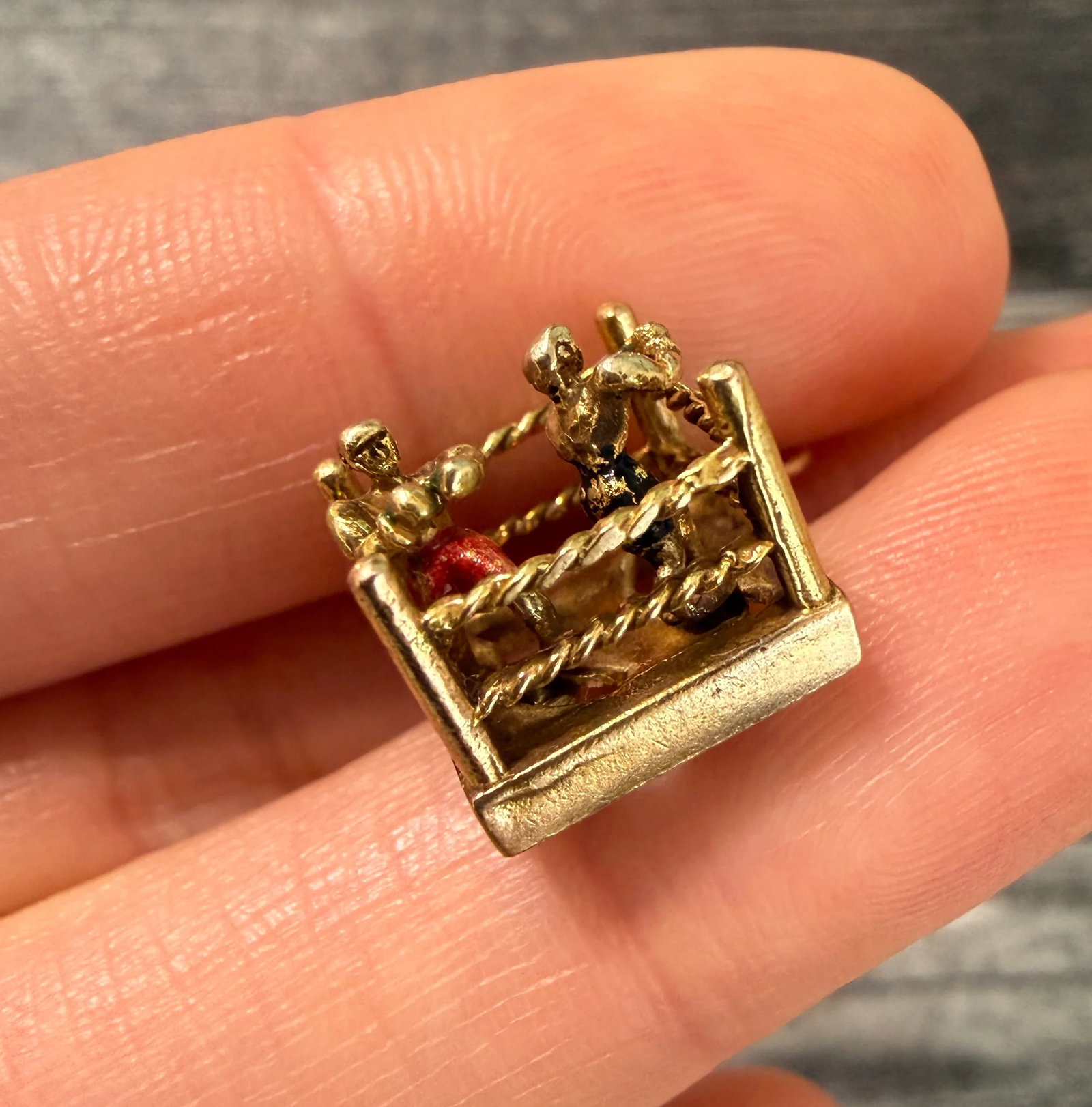 Vintage English Articulated 9K Gold Boxer Charm: Metal: 9K Yellow Gold Weight: 2.8 gramsMeasurements: 0.5 inches long by 0.5 inches wideMarkings: "9 375"Condition: In good condition with some enamel loss and surface wear. Follow us on Instagram @alp