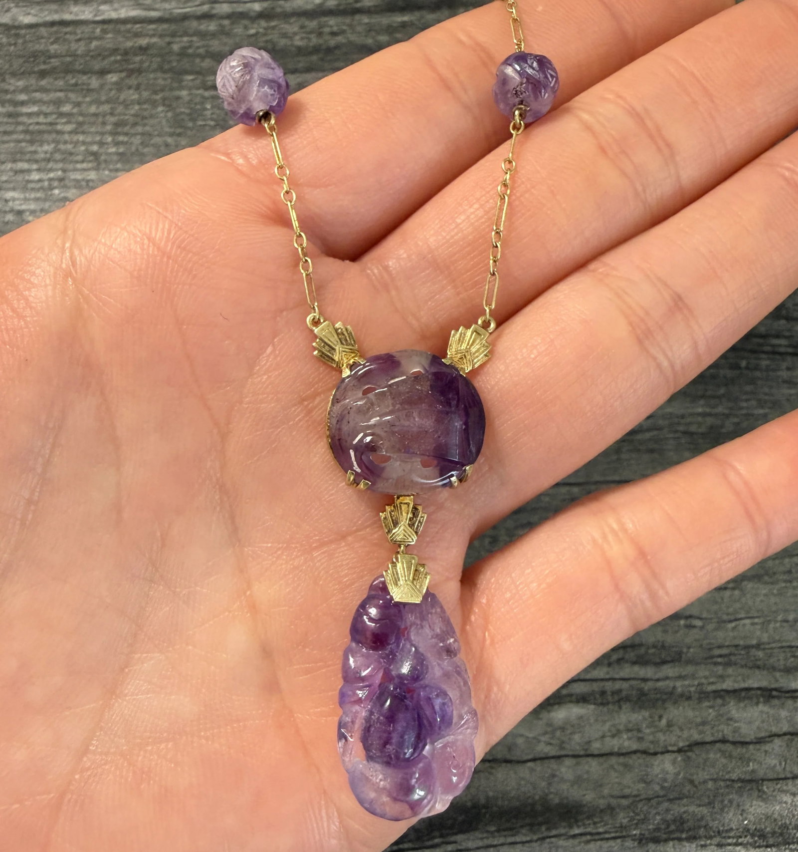 Art Deco Carved Amethyst Peach and 14K Gold Lavalier: Metal: 14K Yellow Gold Weight: 9.7 gramsNecklace Length: 15.75 inches longMarkings: "14K"Condition: In very good condition with some minor surface wear consistent with age.Follow us on Instagram @alph