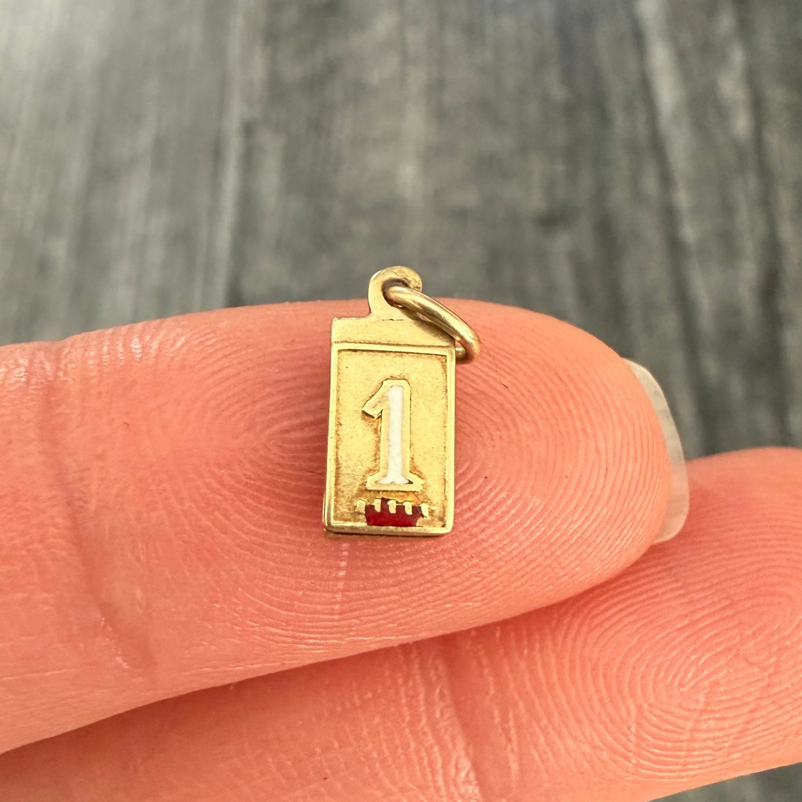 Mini Art Deco Enamel "My Dear" "1 LIEB" Charm: Metal: 14K Yellow Gold Weight: 0.7 gramsMeasurements: 0.55 inches long by 0.20 inches wideCondition: In good condition with some minor enamel loss and some surface wear consistent with age. Follow us 