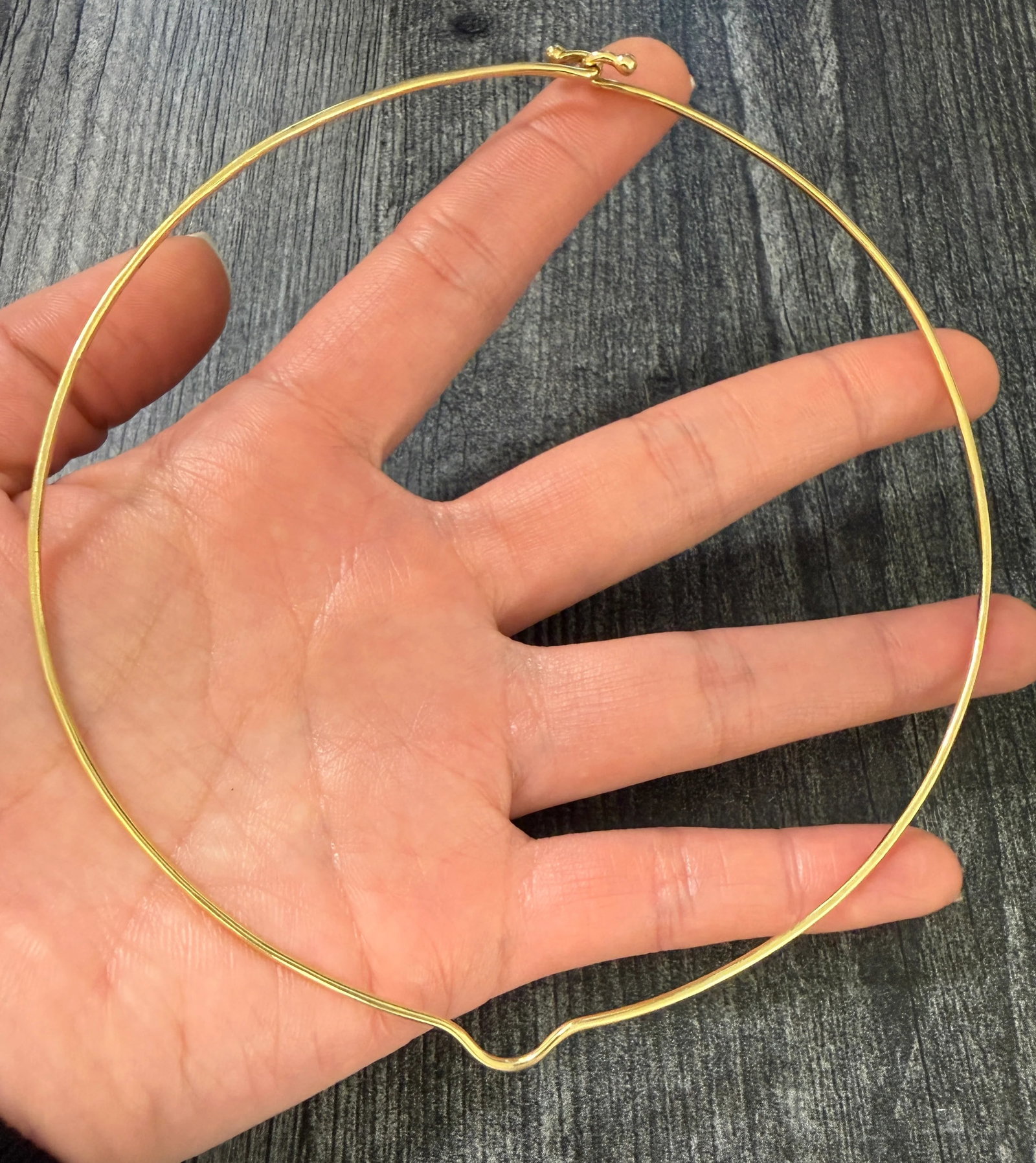 Vintage 14K Gold Wire Collar, 14.4" Circumference: Metal: 14K Yellow Gold Weight: 8.9 gramsInner circumference: 14.4 inches Inner diameter: 4.75 inches long by 4.45 inches wideWidth: 1.5 mm wireMarkings: NoneCondition: In good condition with some mino