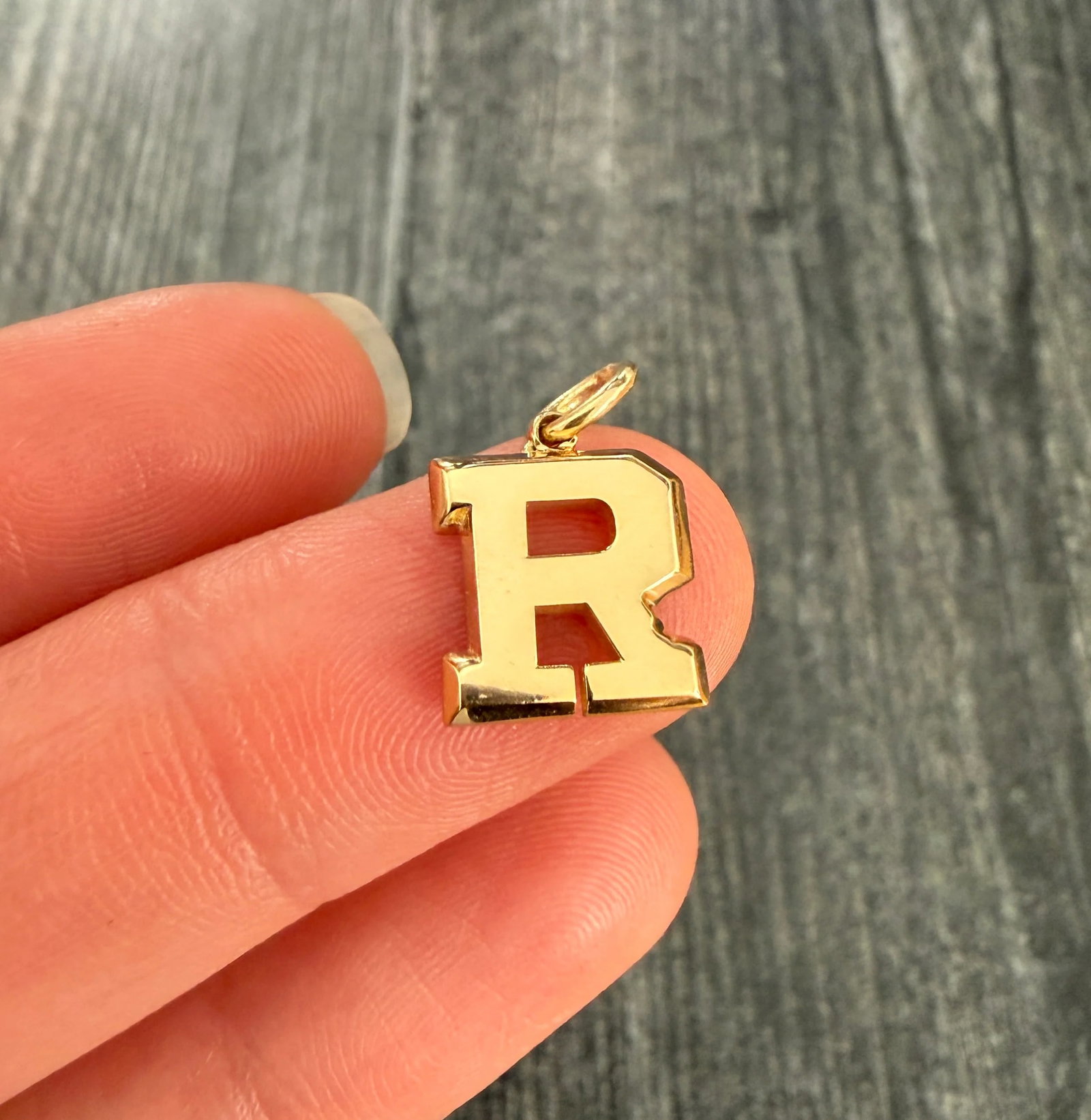 Custom A/O Varsity Block Font 14K Gold Initial R Charm: Metal: 14K Yellow Gold Weight: Approx 2.4 gramsMeasurements: 0.45 inches long by 0.45 inches wideMarkings: "14K"These custom charms will take between 1-2 weeks to ship!