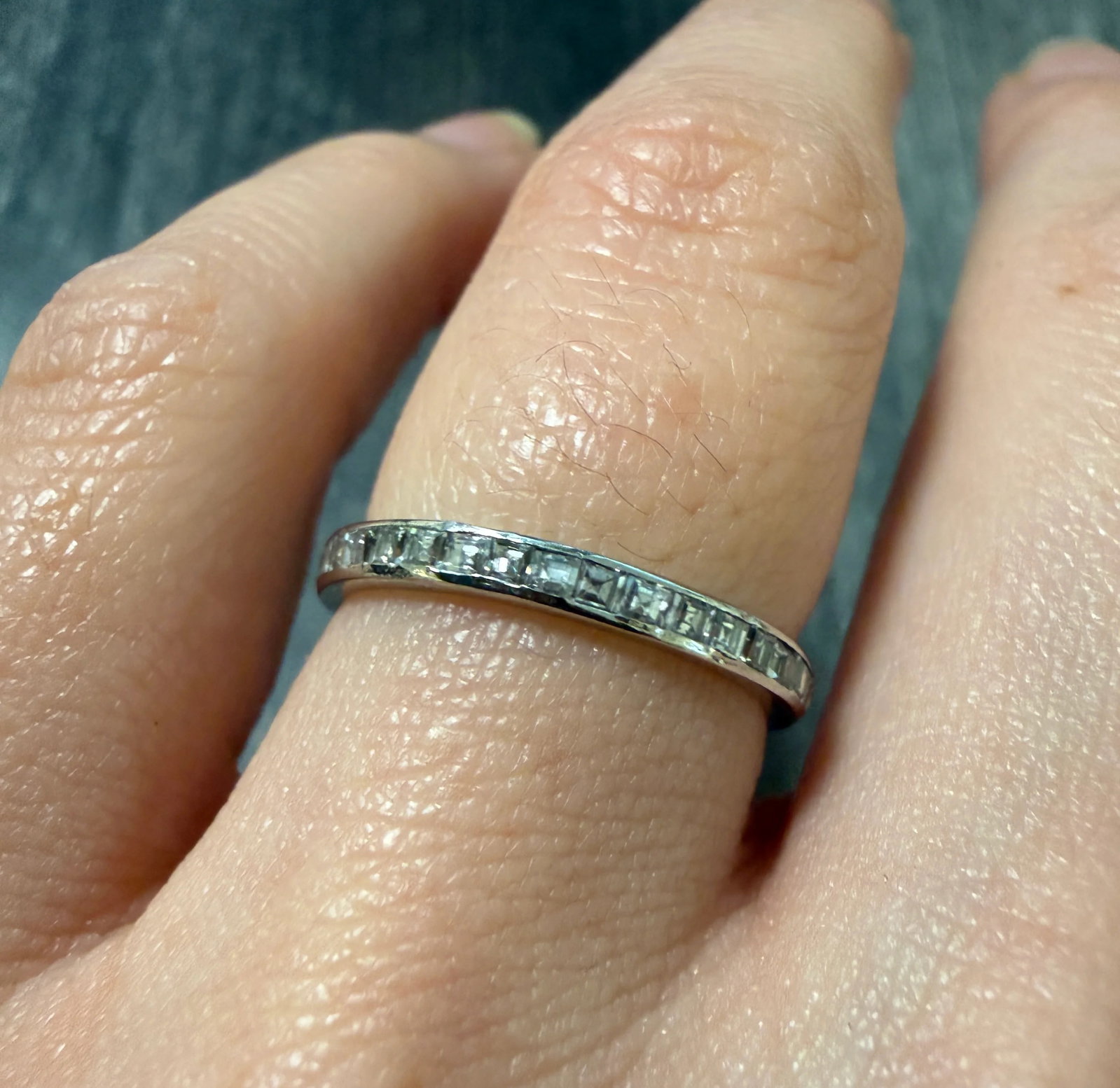 Carre Cut Diamond and Platinum Band, Size 6.25: Metal: Platinum (acid tested)Weight: 2 gramsDiamonds: Approximately 0.50 caratsRing Size: 6.25Width: 2.1 mmMarkings: None Condition: The ring appears to have been previously resized. In good condition