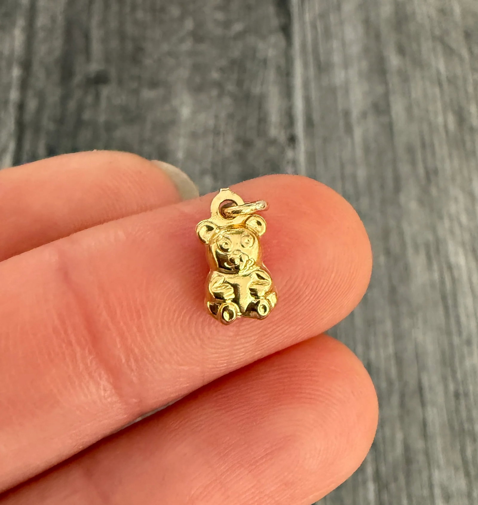 Puffy 18K Gold Teddy Bear Charm: Metal: 18K Yellow Gold (Acid Tested)Weight: 0.5 gramsMeasurements: 0.3 inches long by 0.2 inches wideMarkings: None Condition: In very good condition with some minor surface wear consistent with age. 
