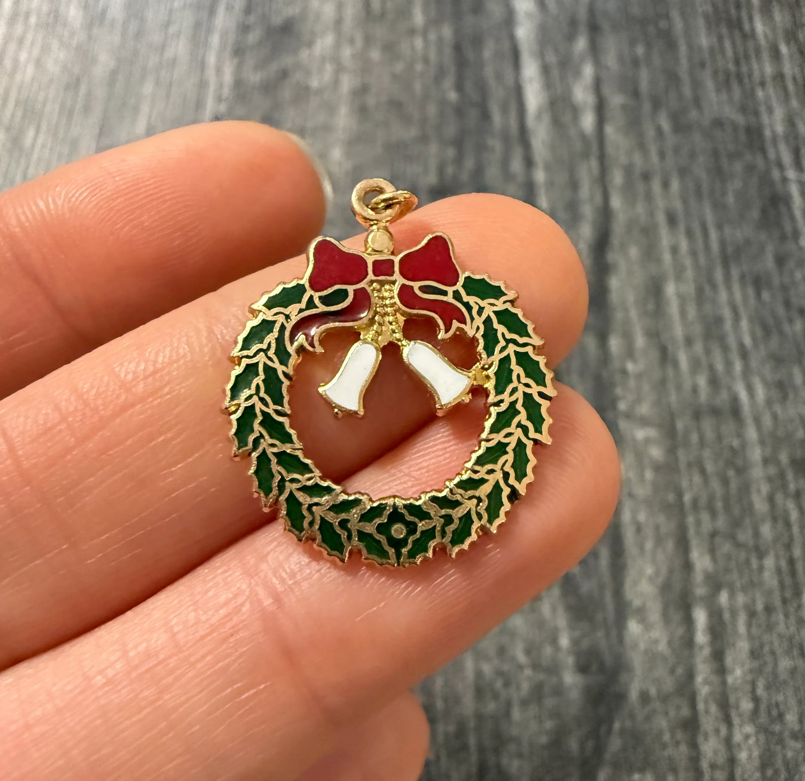 Vintage Enamel and 14K Gold Christmas Wreath Charm: Metal: 14K Yellow Gold Weight: 3.6 gramsMeasurements: 0.8 inch diameterMarkings: "14K"Condition: In good condition with some minor surface wear consistent with age. Follow us on Instagram @alphaomegaj