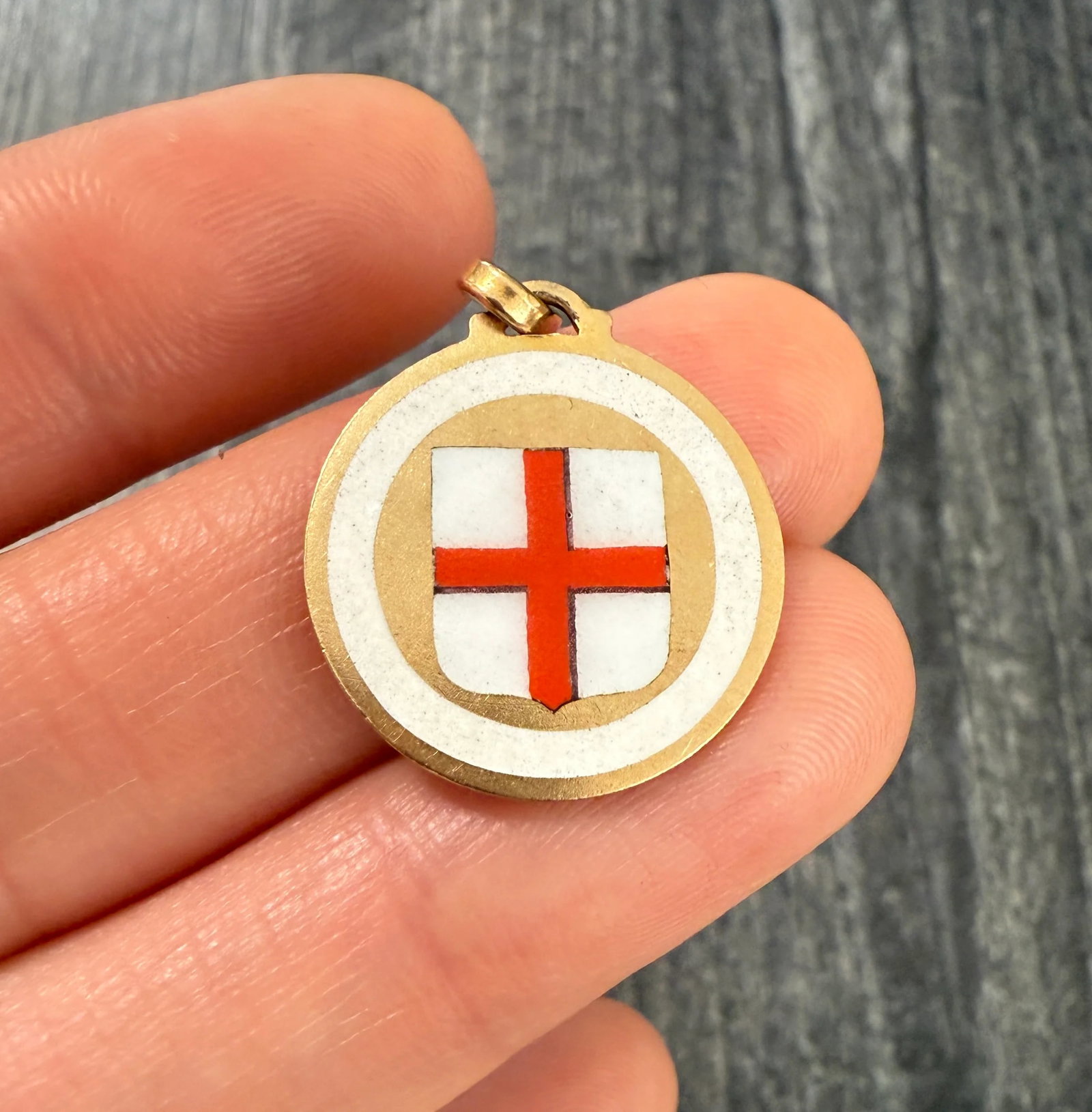 Enameled 18K Gold Coat of Arms of Genoa, Saint George's Cross: Metal: 18K Yellow Gold (bale is not gold)Weight: 4.1 gramsMeasurements: 0.8 inches diameterMarkings: "750"Condition: In very good condition with some minor surface wear consistent with age. Follow us 