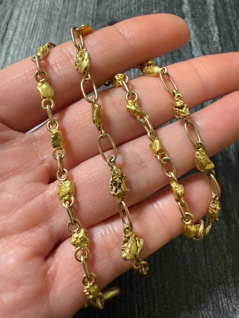 Vintage Gold Nugget Necklace / Bracelet, 15.6" Long: Metal: Nuggets range from 18K to 22K Gold, Jump rings are 10K, and Clasps/Dog Clips are 14K Gold Weight: 23.8 gramsMeasurements: 15.6 inches long by 7.3 mm wideMarkings: "14K" "10K" "14Kt"Condition: I