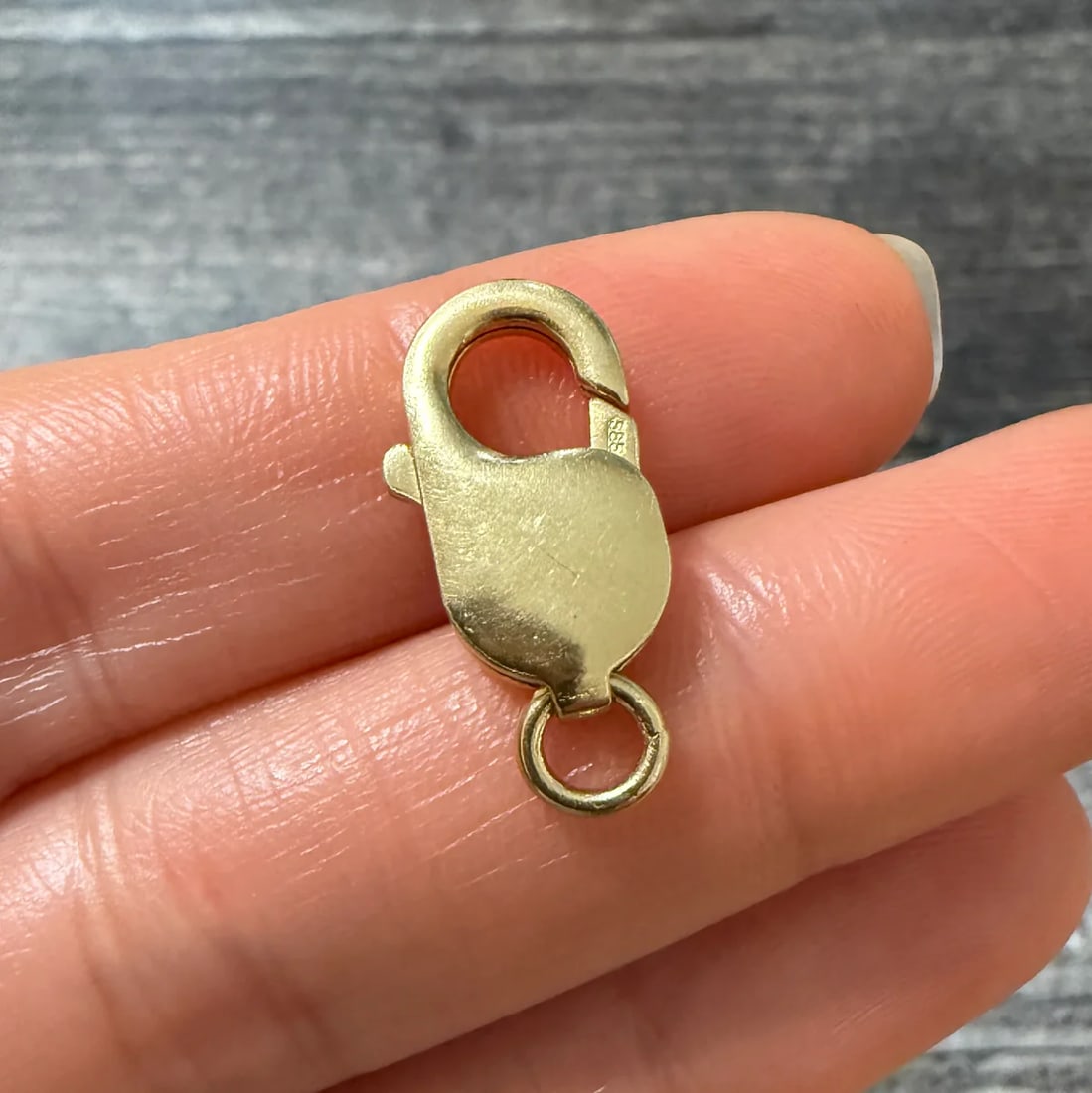 Jumbo 14K Gold Lobster Clasp (Y): Metal: 14K Yellow Gold Weight: 3.3 gramsMeasurements: 0.75 inches long by 0.45 inches wideMarkings: "585"Condition: In very good condition with some minor surface wear consistent with age. Follow us o