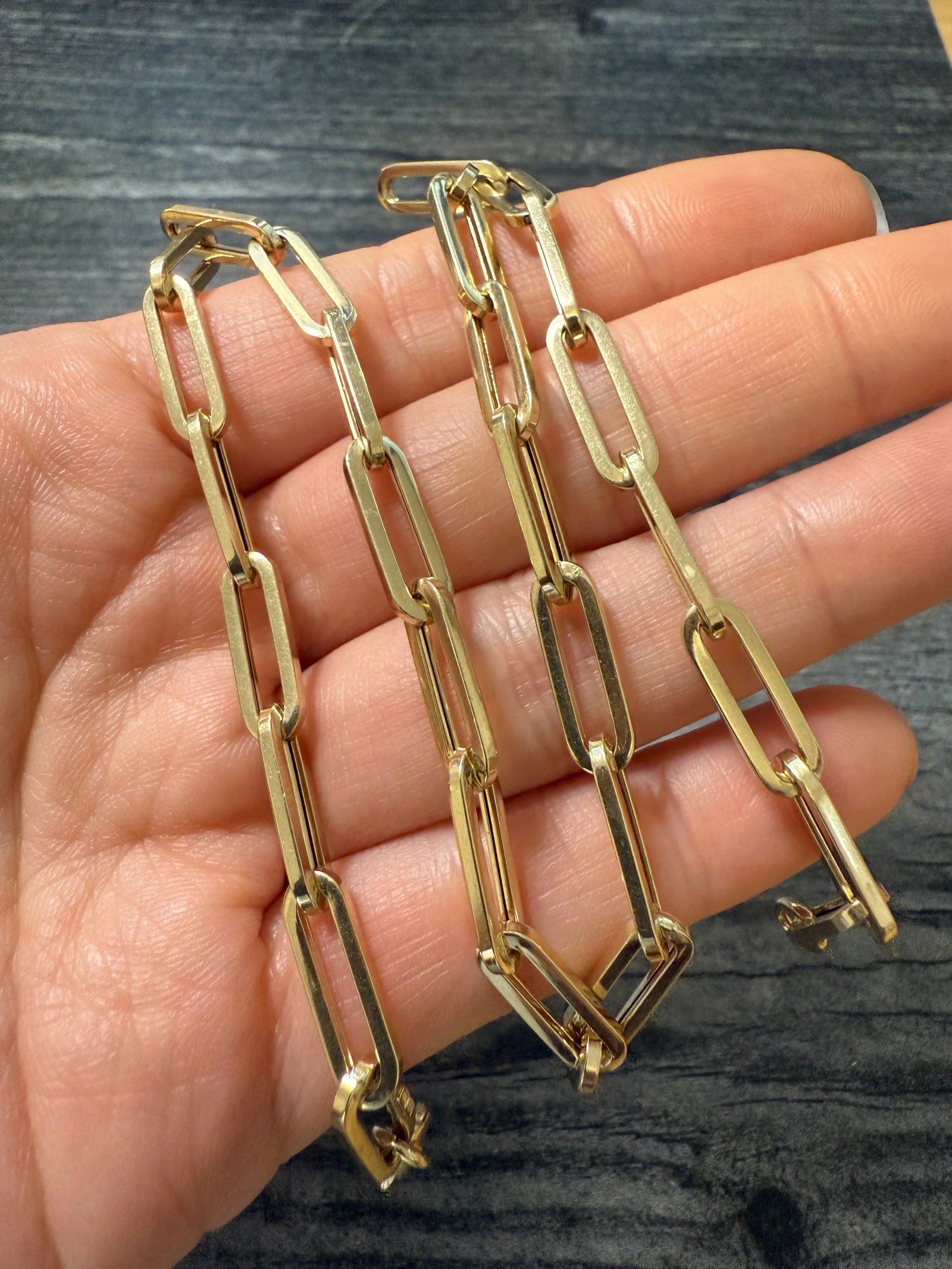 Classic 14K Gold Paperclip Chain, 16" Long: Metal: 14K Yellow Gold Weight: 11.2 gramsMeasurements: 16 inches long by 5.2 mm wideMarkings: "14Kt ITALY"Condition: In very good condition with some minor surface wear consistent with age. Follow us 