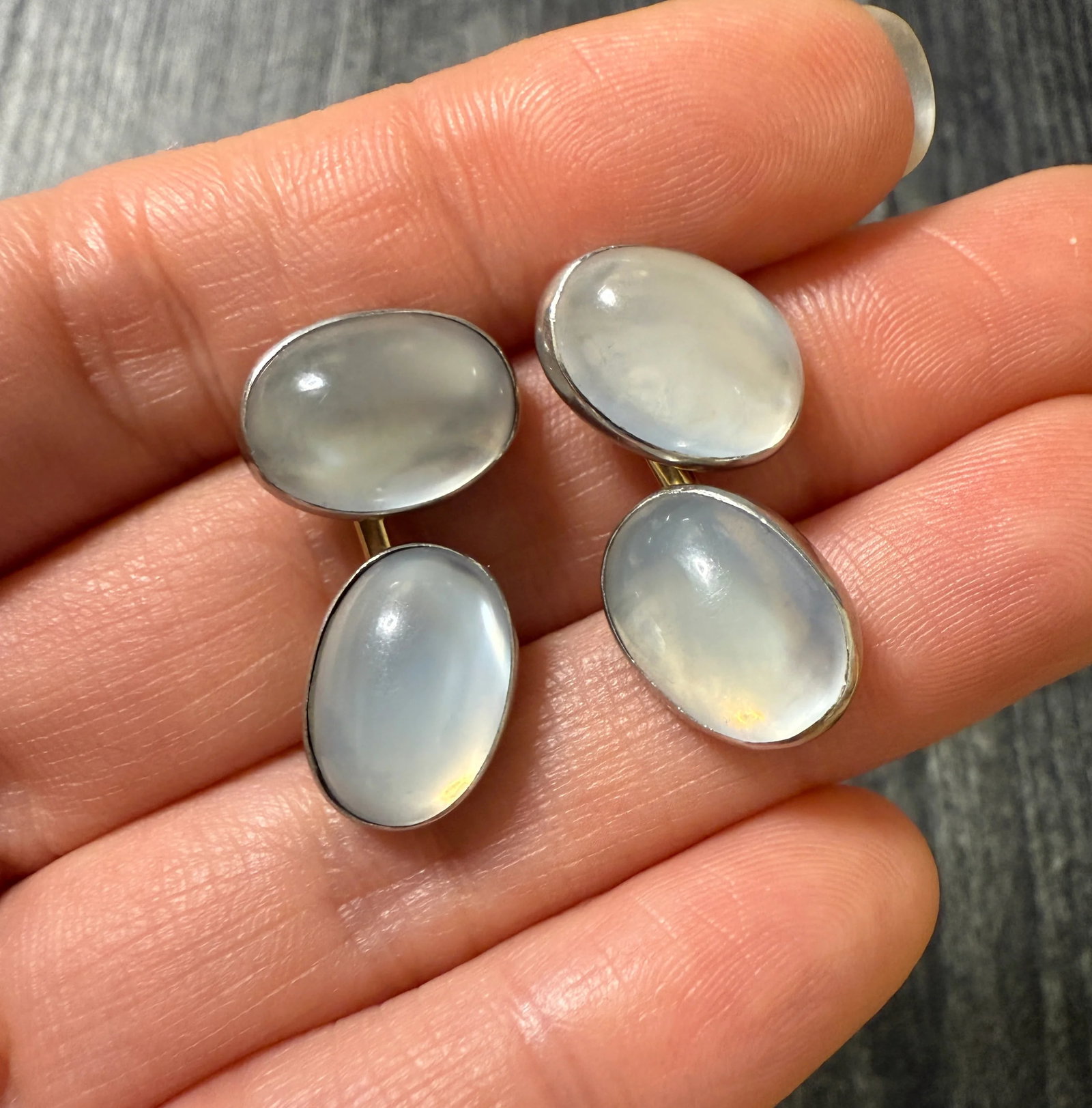 Vintage Moonstone Cufflinks in Platinum and 14K Gold: Metal: 14K Yellow Gold and PlatinumWeight: 9.6 gramsMoonstone Measurements: Approx 14.5 mm long by 10.5 mm wide eachMarkings: "GOLD&PLAT 14"Condition: In good condition with some minor surface wear on