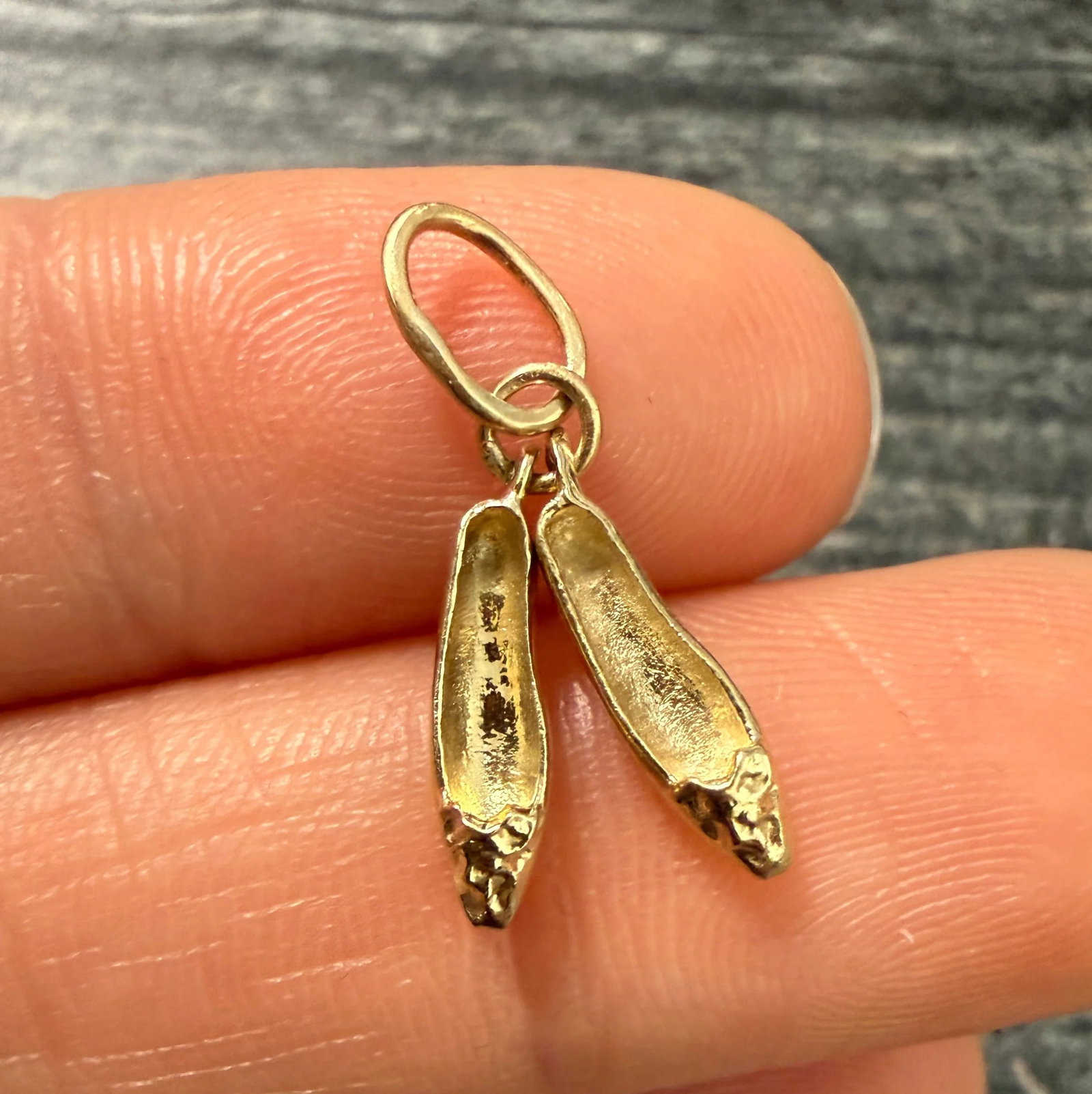 Vintage 14K Gold Ballerina Shoes Charm: Metal: 14K Yellow Gold Weight: 1.2 gramsMeasurements: 0.5 inches long Markings: "6-16-60"Condition: In very good condition with some minor surface wear consistent with age. We can remove the current l