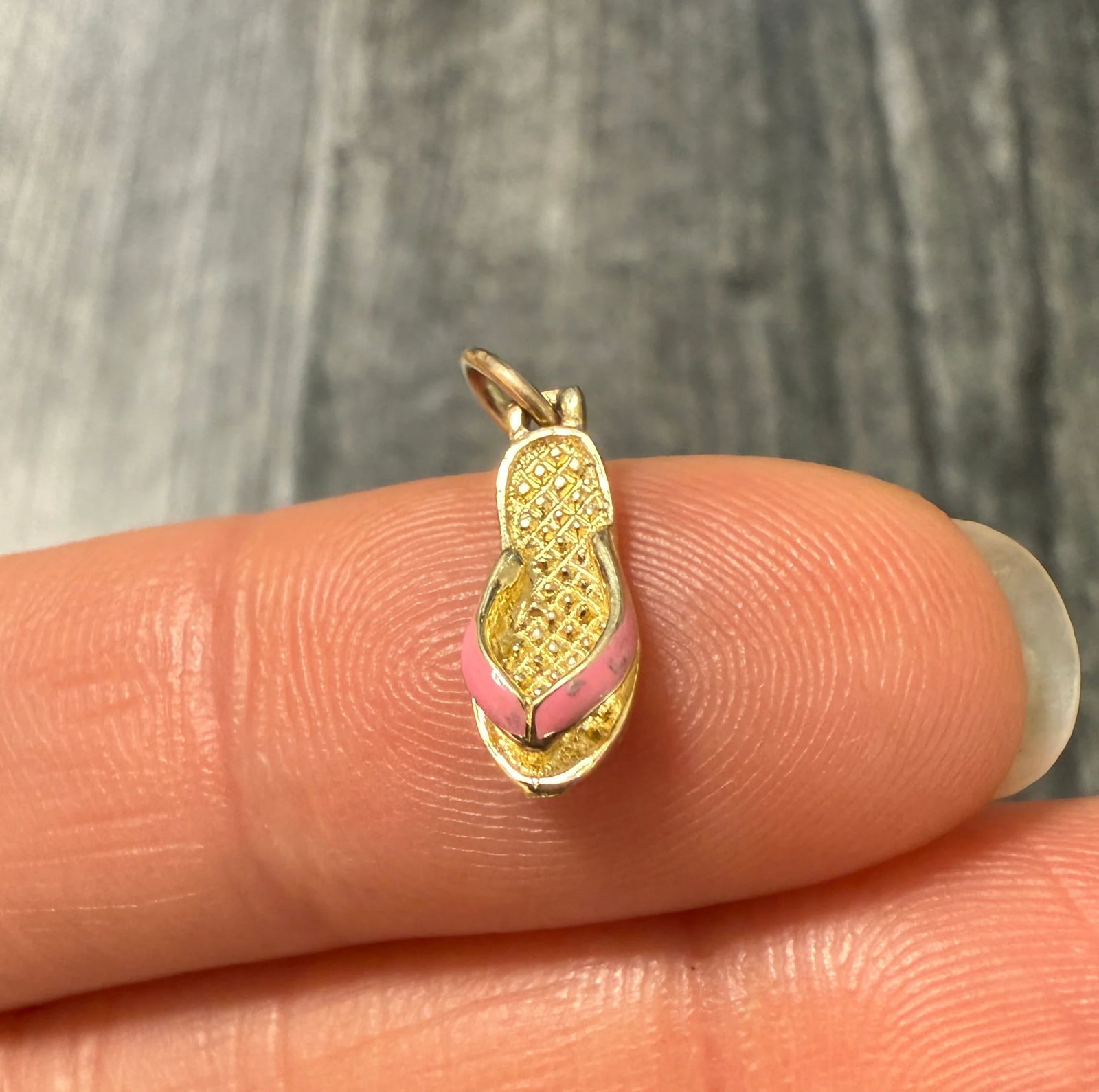 Pink Enamel and 14K Gold Flip Flop Sandal Charm: Metal: 14K Yellow Gold (Acid Tested)Weight: 0.6 gramsMeasurements: 0.5 inches long by 0.3 inches wideMarkings: NoneCondition: In very good condition with some minor surface wear consistent with age. F