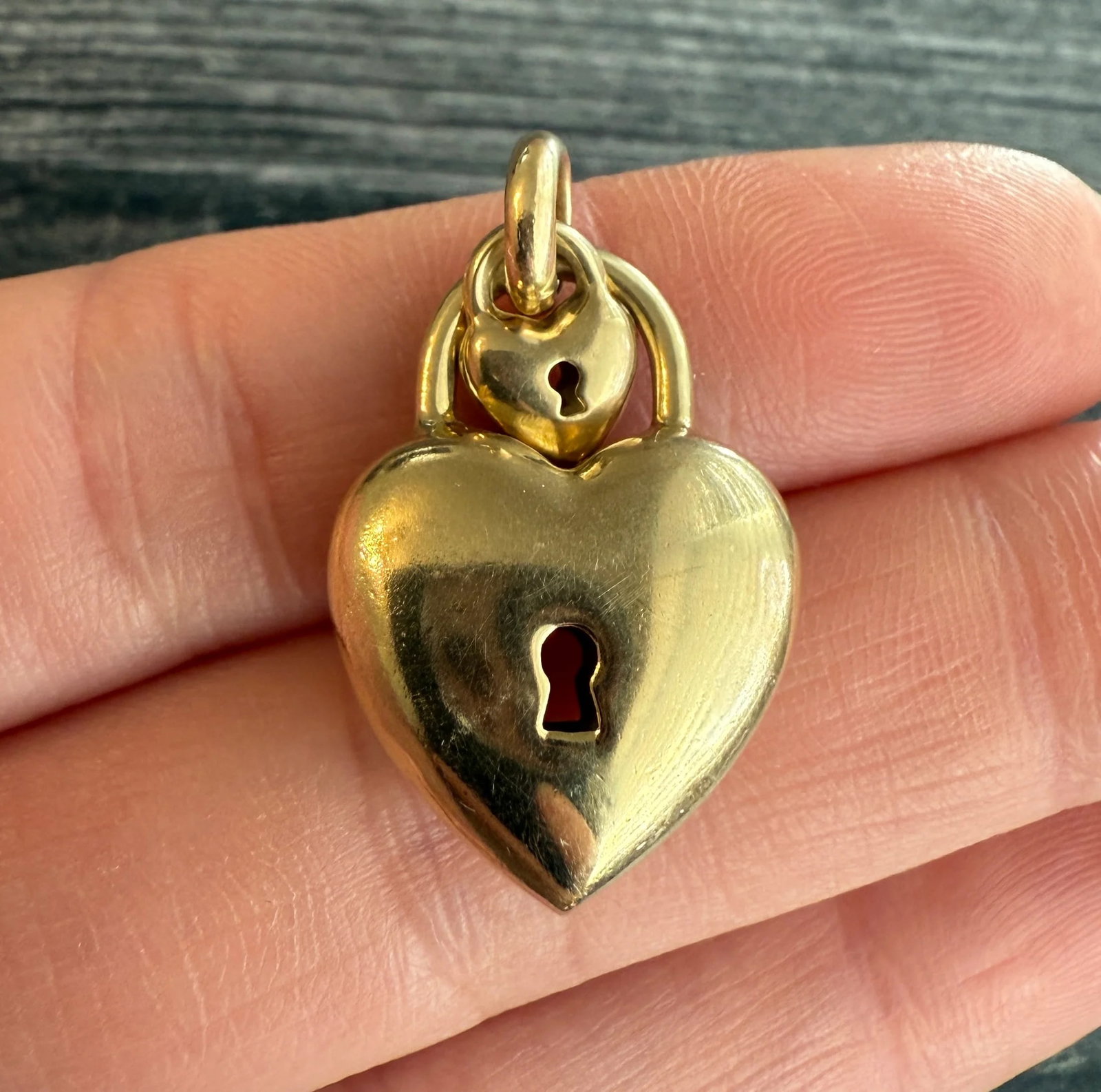 Large Vintage 14K Gold Double Puffy Heart Padlock Charm (3): Metal: 14K Yellow Gold Weight: 3.2-3.3 grams eachMeasurement: 1.05 inches long by 0.75 inches wide Markings: NoneCondition: In good condition with some small dings and pin points on the hearts as well