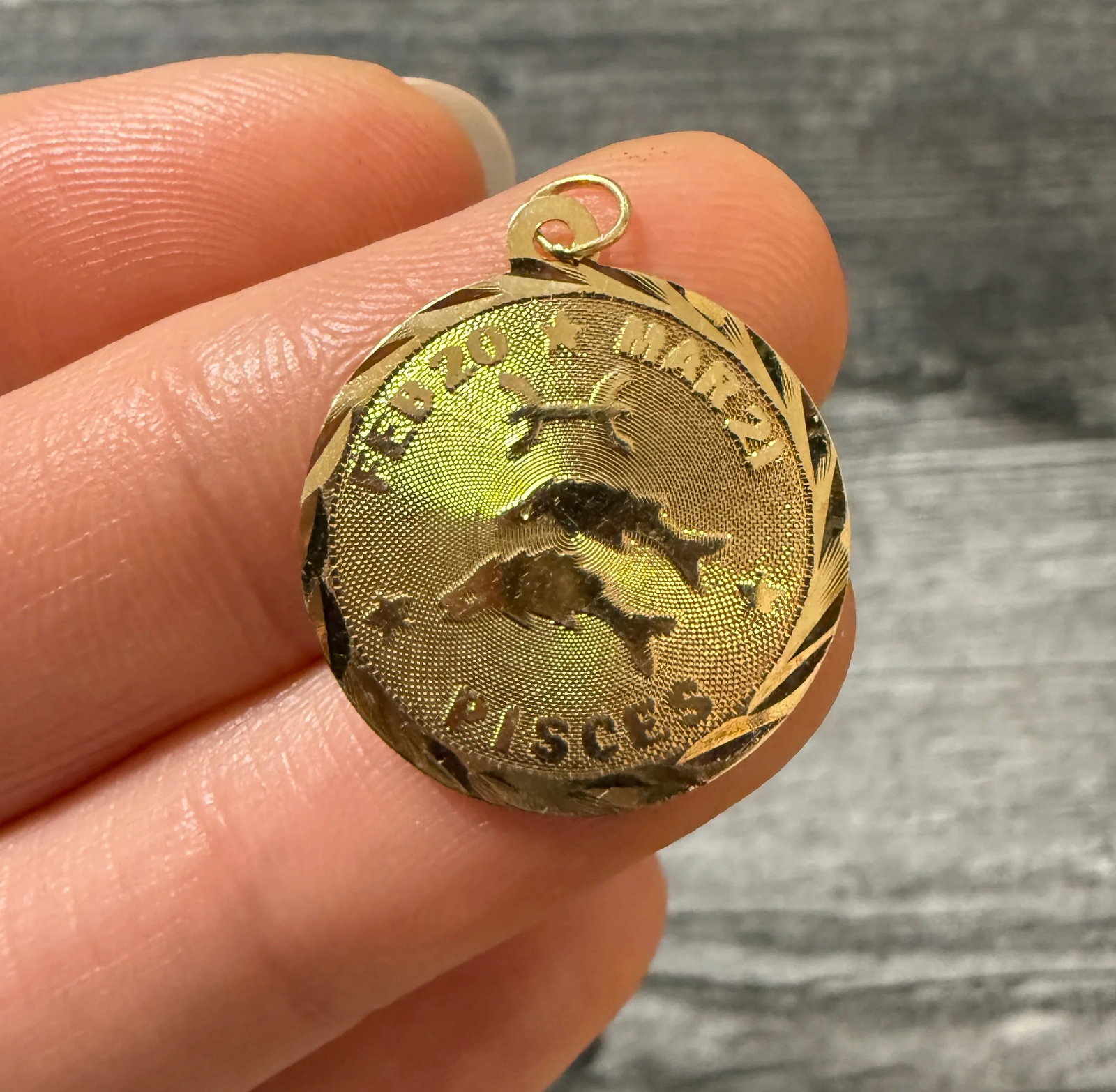 Vintage 14K Gold Pisces Zodiac Charm: Metal: 14K Yellow Gold Weight: 0.7 gramsMeasurements: 0.75 inch diameter Markings: "14K"Condition: In very good condition with some minor surface wear consistent with age. Follow us on Instagram @alph