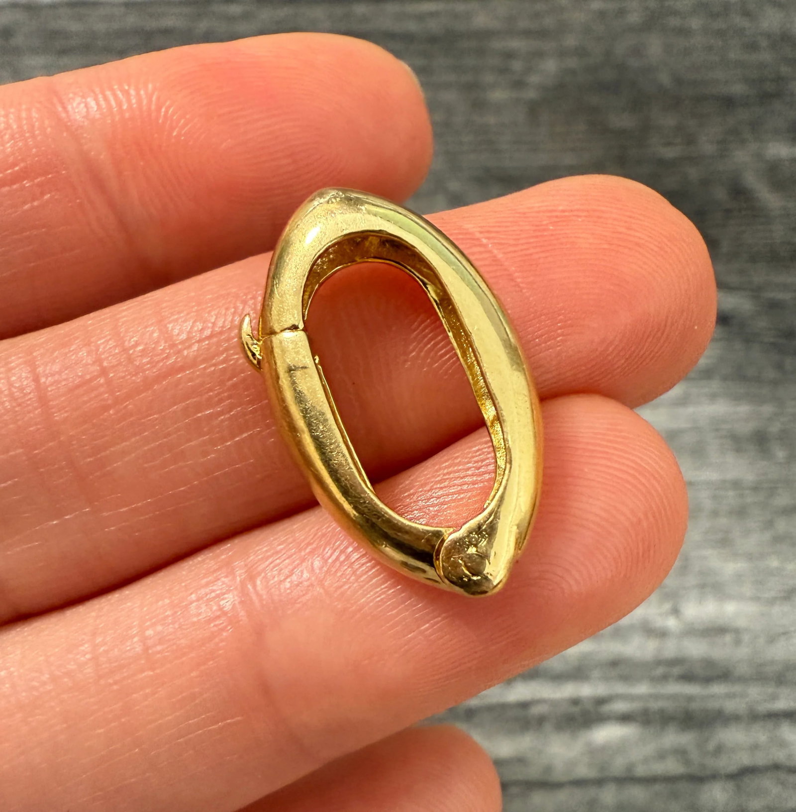 Vintage 18K Gold Almond Shaped Hinge Clasp: Metal: 18K Yellow Gold (acid tested)Weight: 3.3 gramsMeasurements: 0.95 inches long by 0.5 inches wideWidth of the Opening: 4.5 mm wide Markings: NoneCondition: In very good condition with some minor 